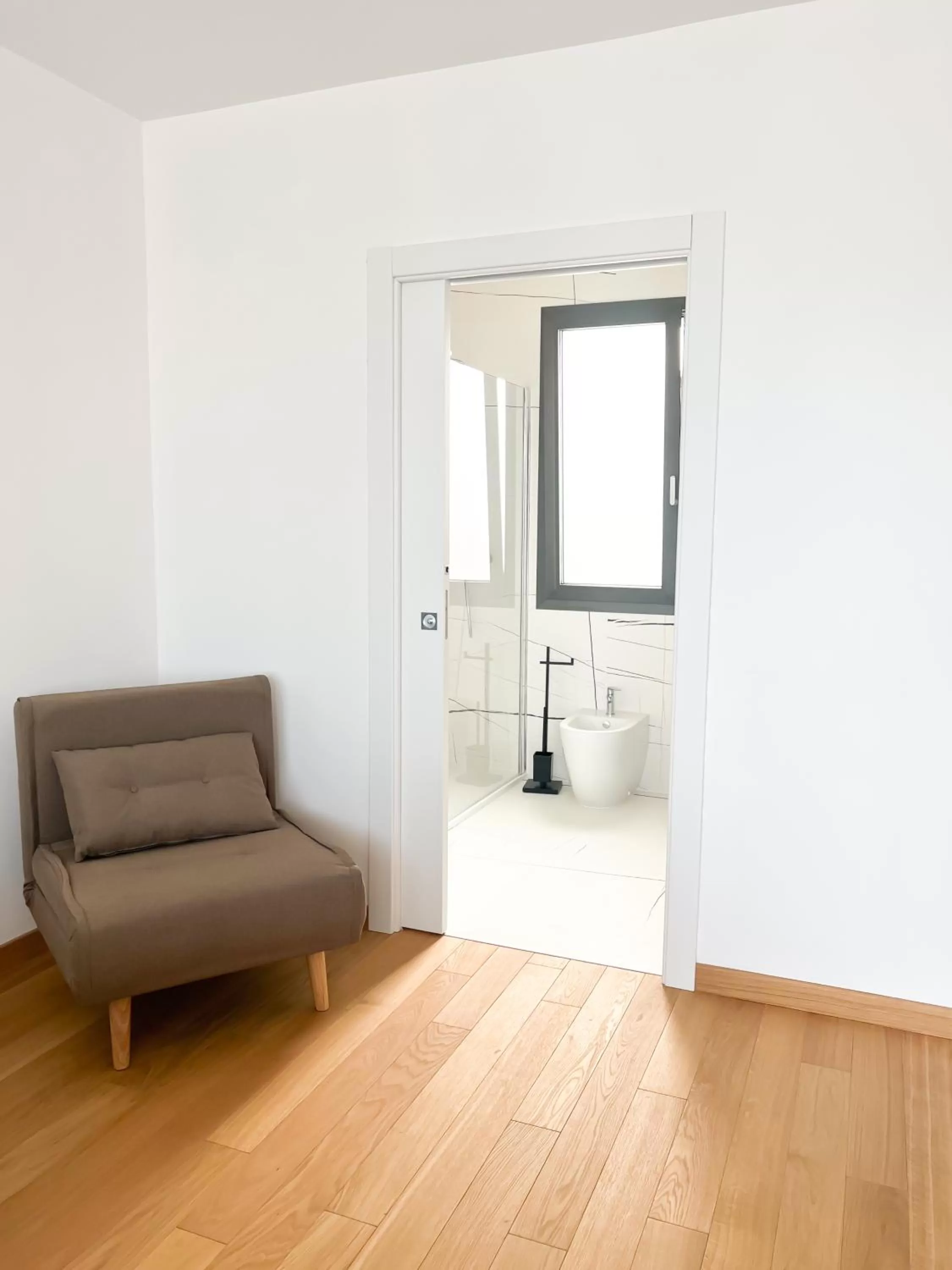 Seating Area in Glass House - Smart Rooms & Parking