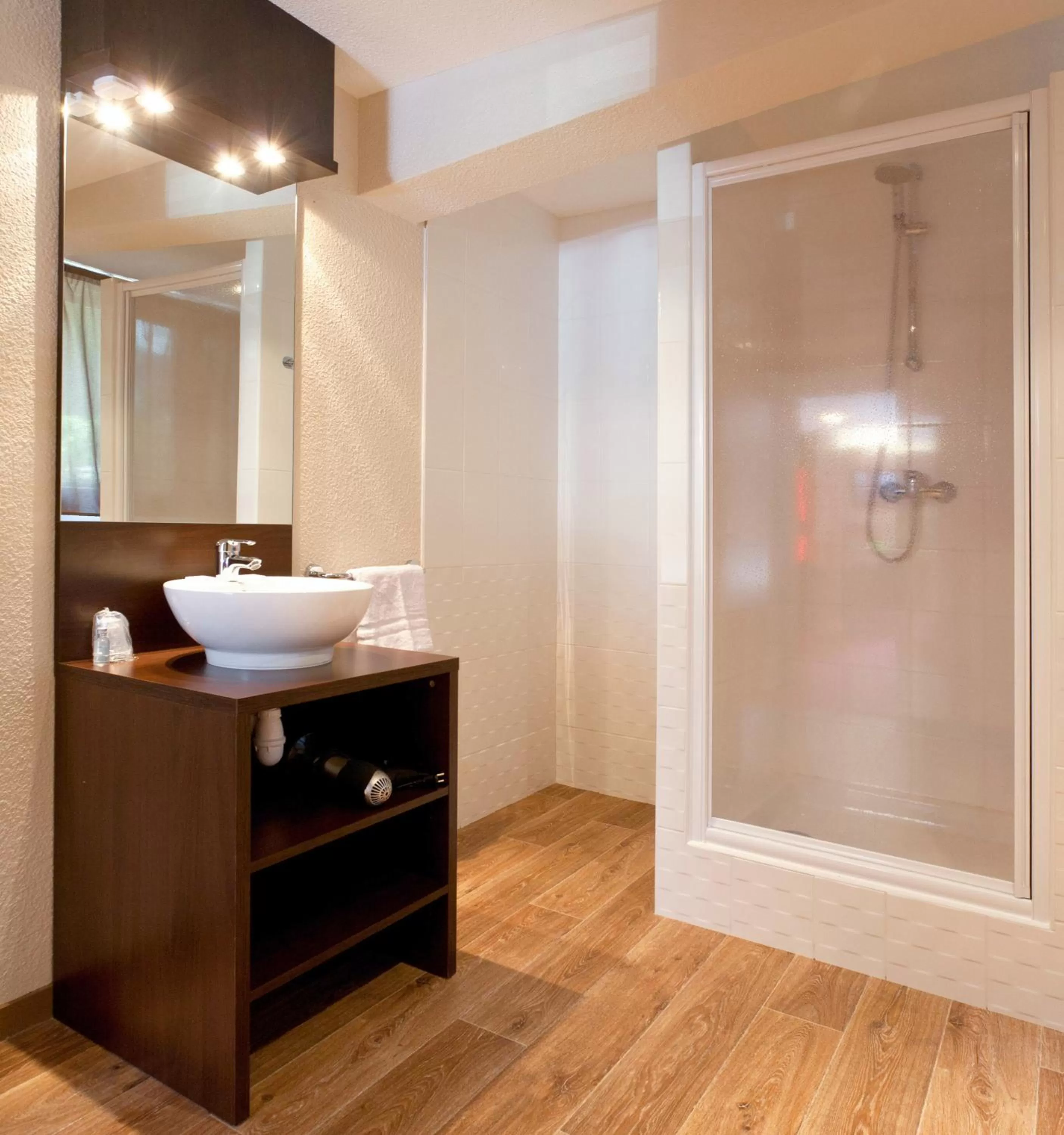 Bathroom in SOWELL HOTELS Mont Blanc et SPA