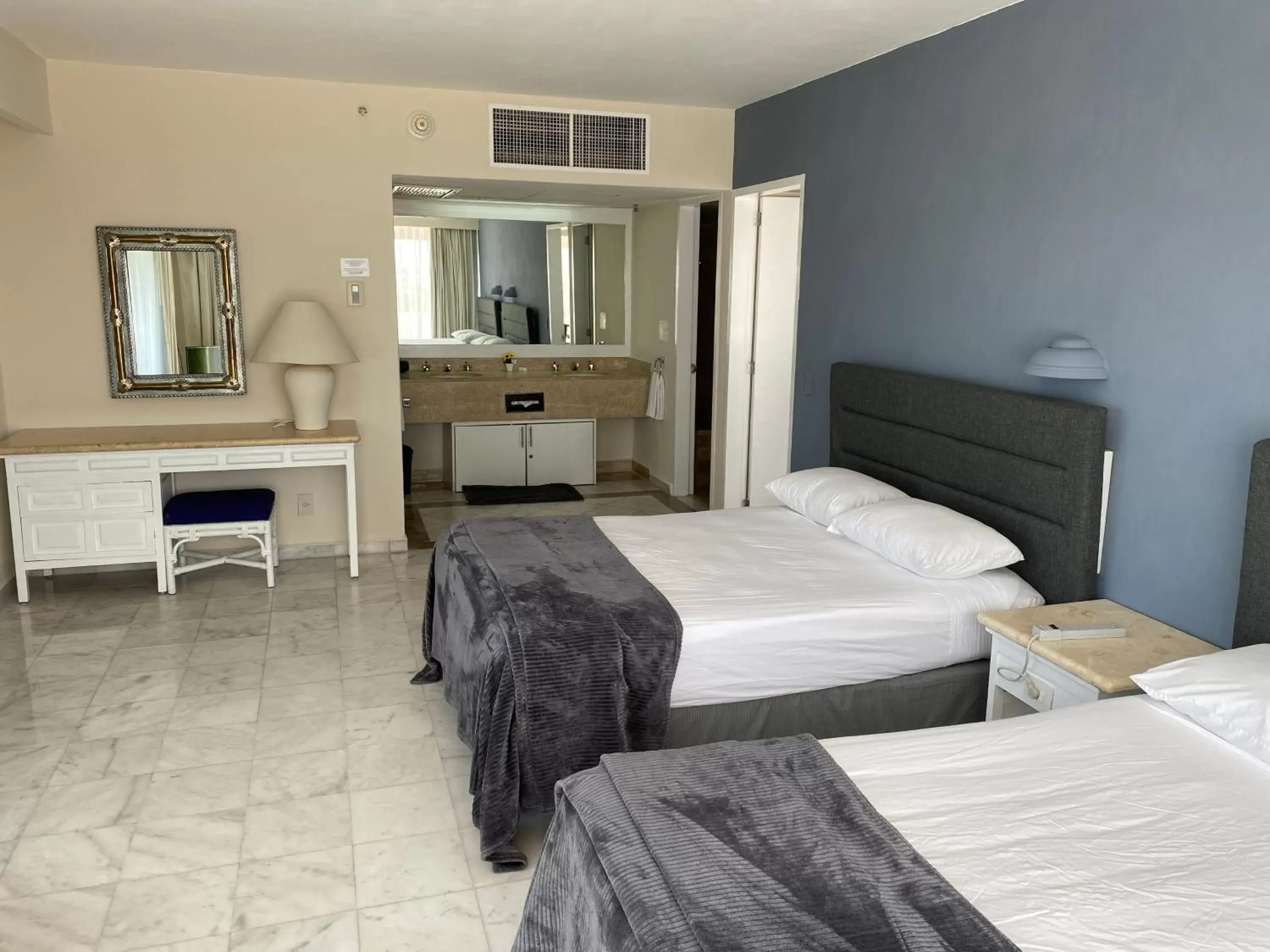 Bedroom, Bed in Condos inside an Ocean Front Hotel Resort