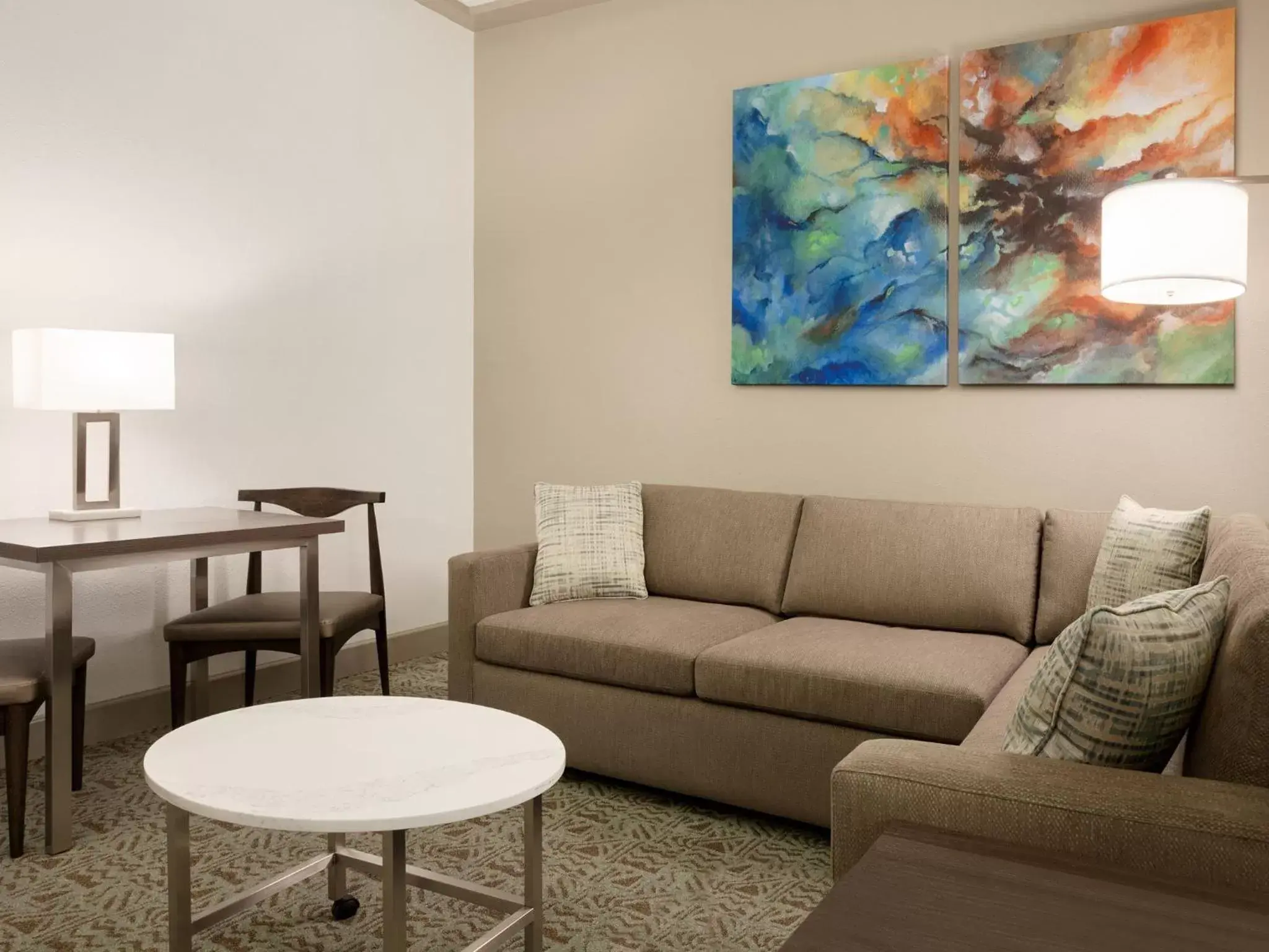 Bed, Seating Area in Buena Vista Suites Orlando