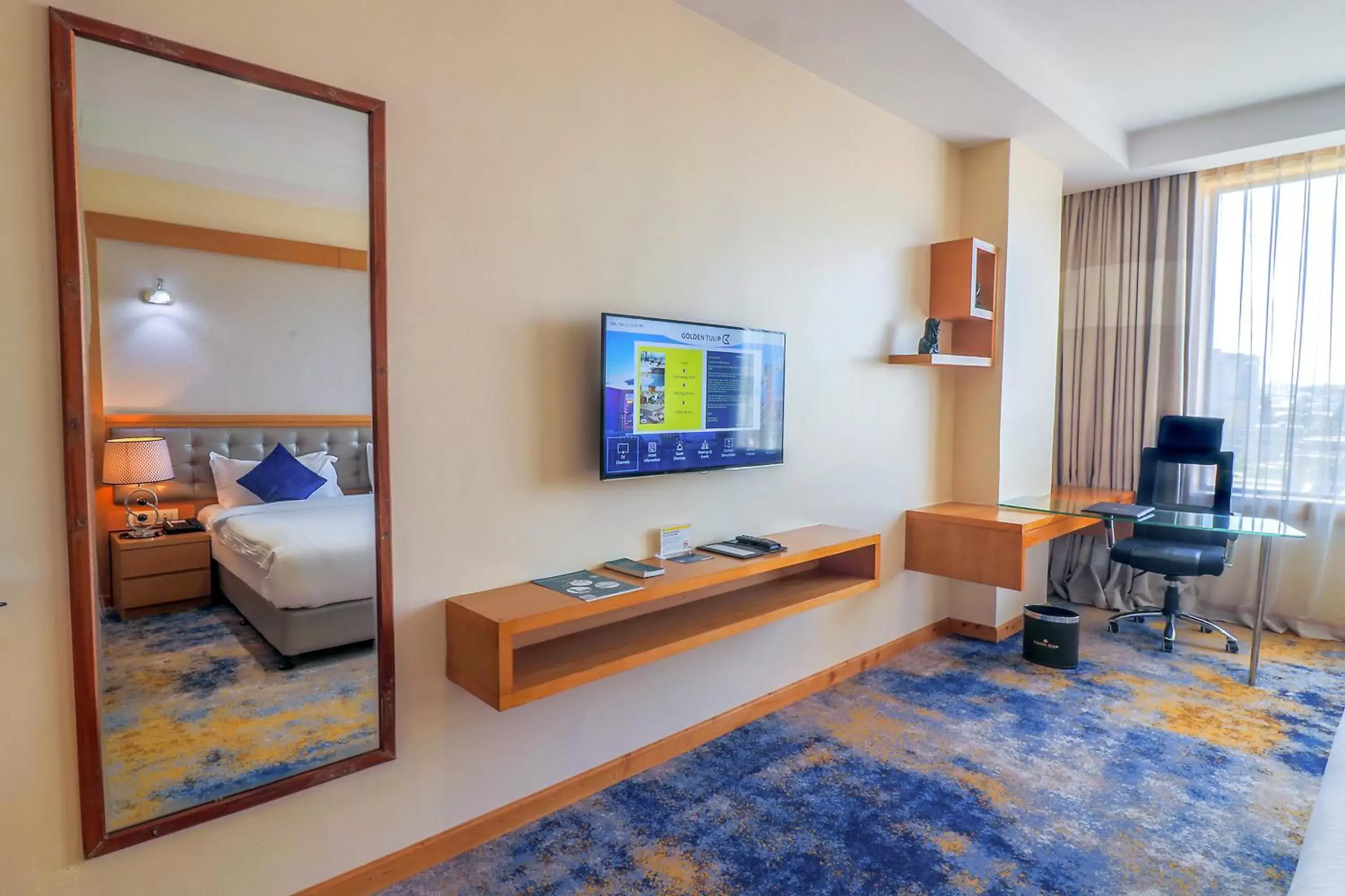 Bedroom, TV/Entertainment Center in Golden Tulip Westlands Nairobi