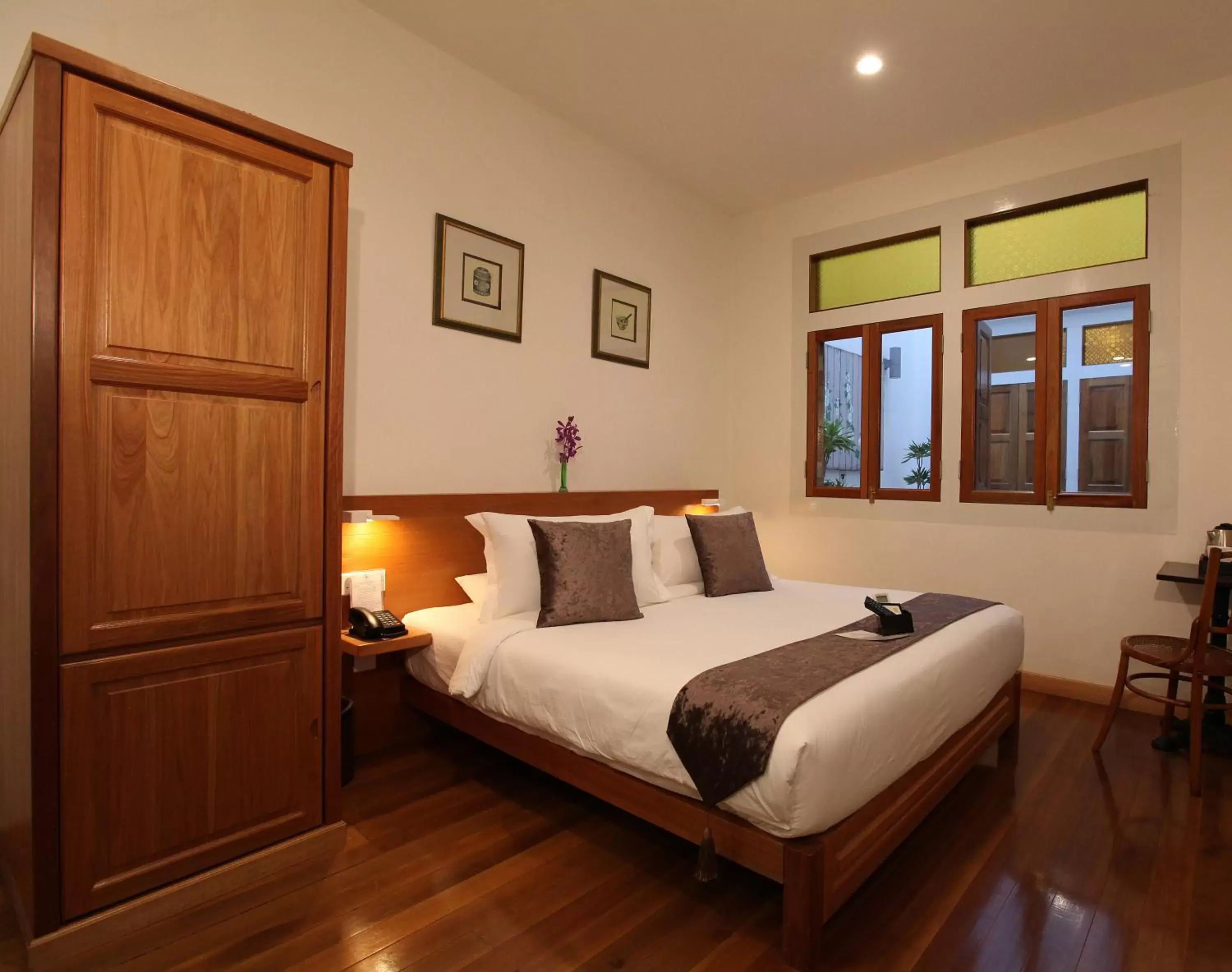 Bed in Gingerflower Boutique Hotel