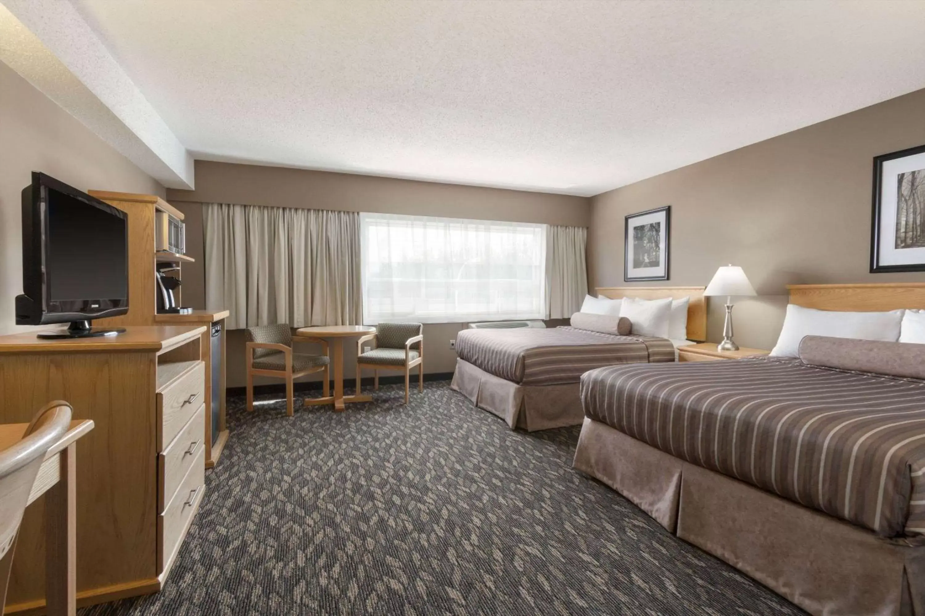 Photo of the whole room, TV/Entertainment Center in Travelodge by Wyndham Prince George