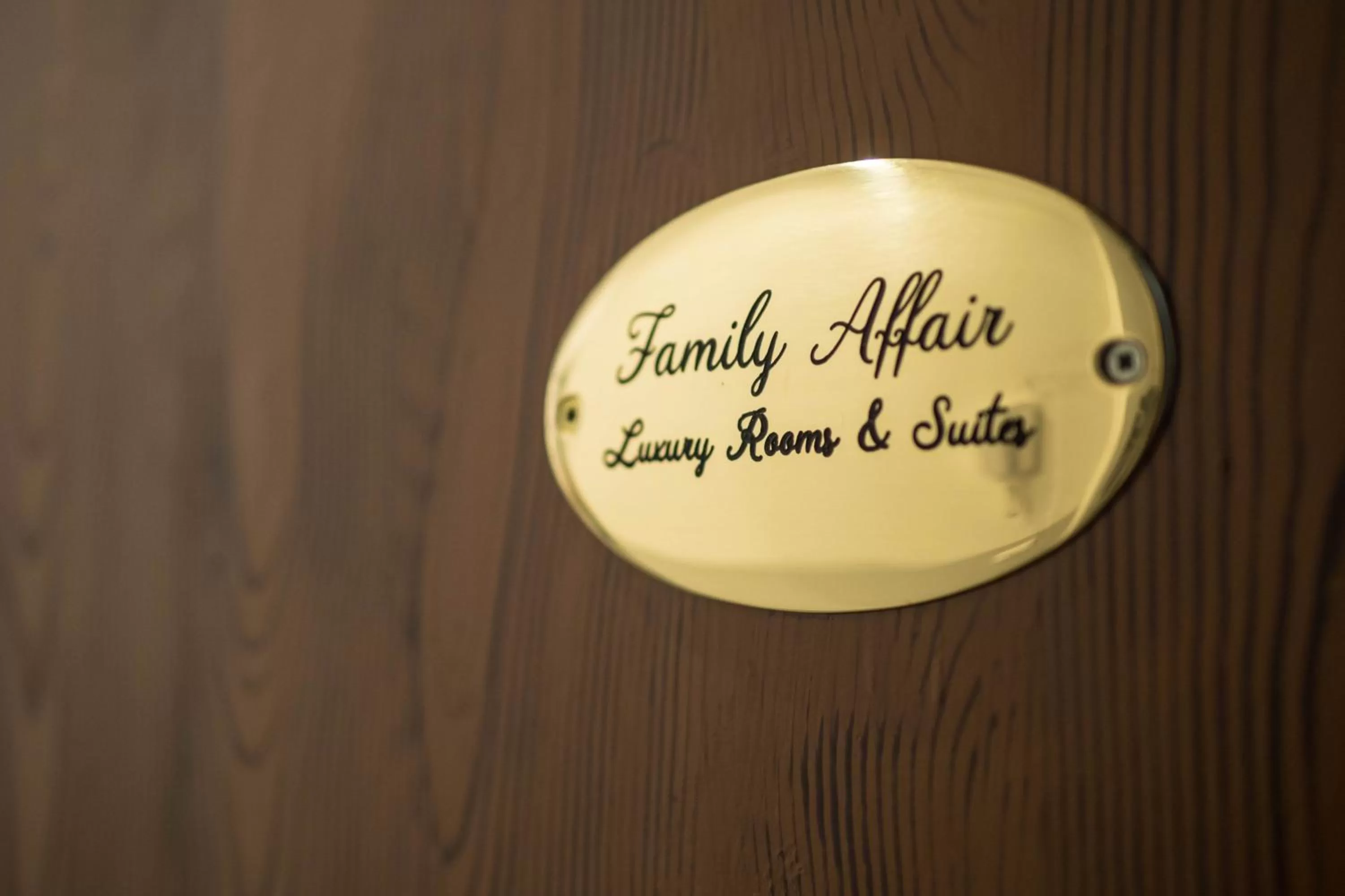 Property logo or sign in Family Affair Luxury Rooms&Suites