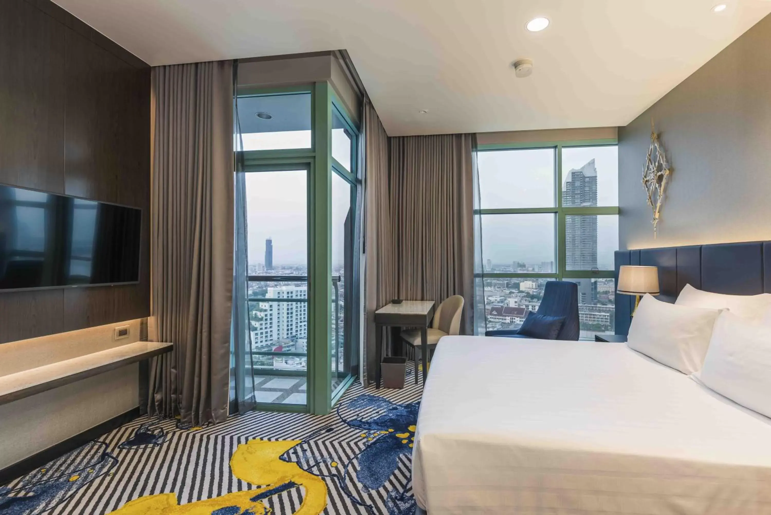 Bed in Chatrium Hotel Riverside Bangkok