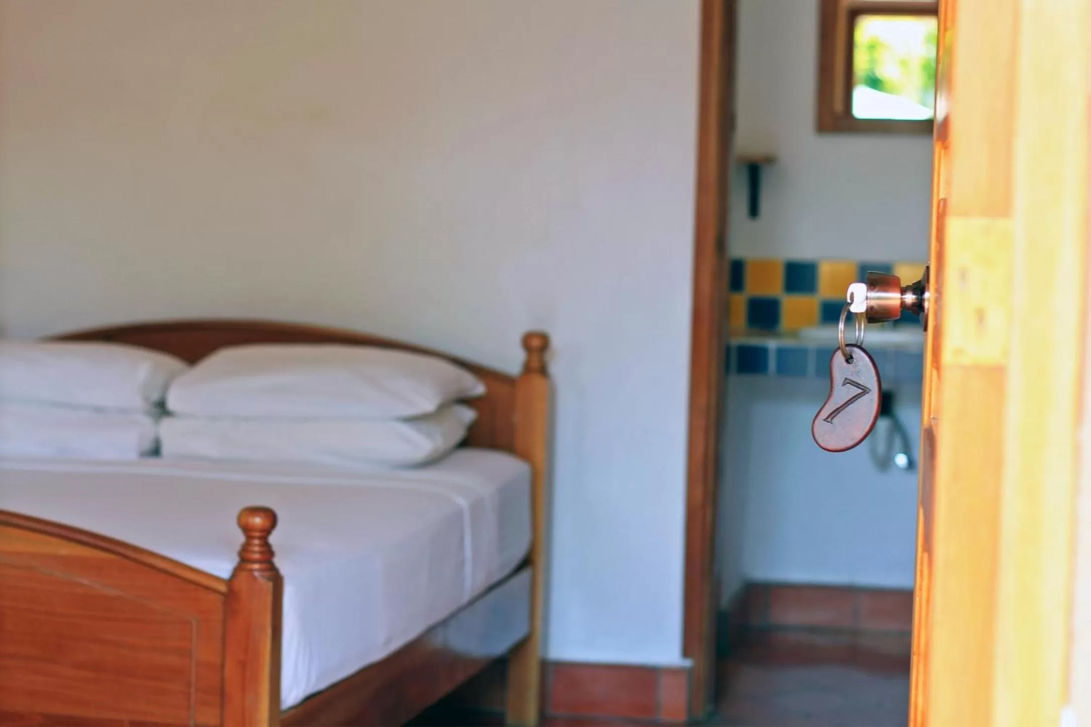 Bed in La Casa de Cafe Bed and Breakfast