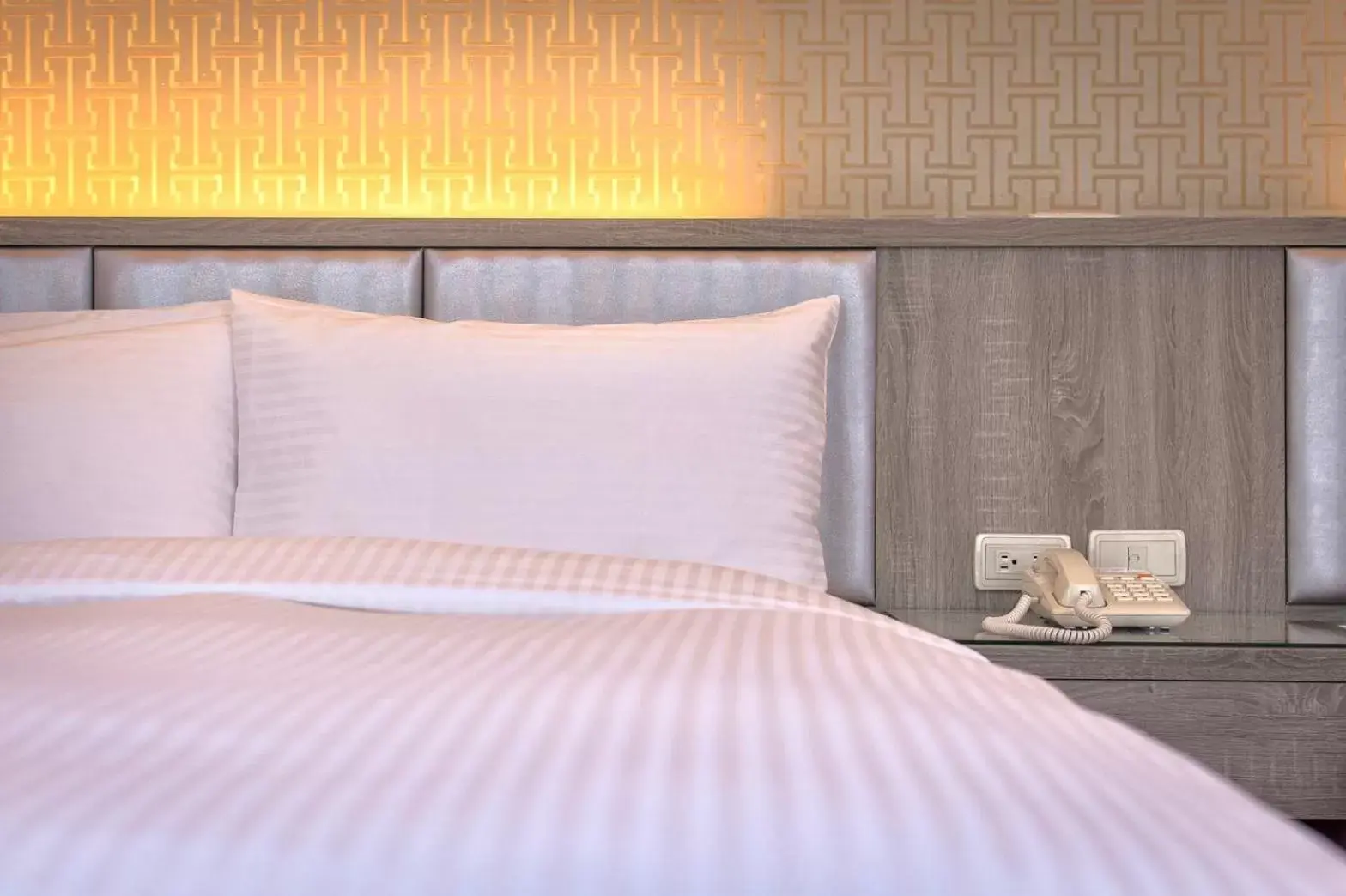 Bed in Mei Hotel Bed in Mei Hotel