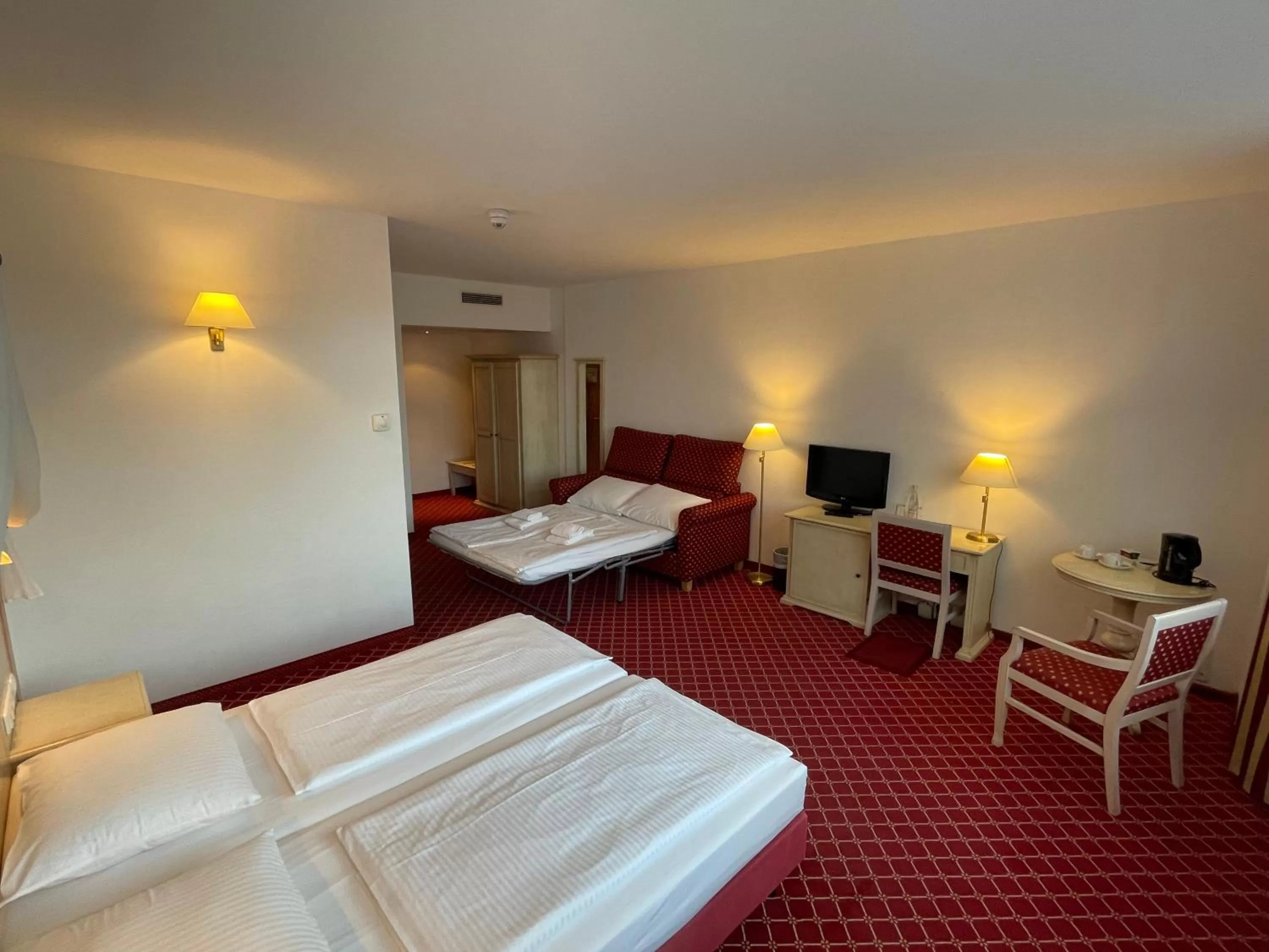 Bed in Hotel Chateau Kurfürstendamm