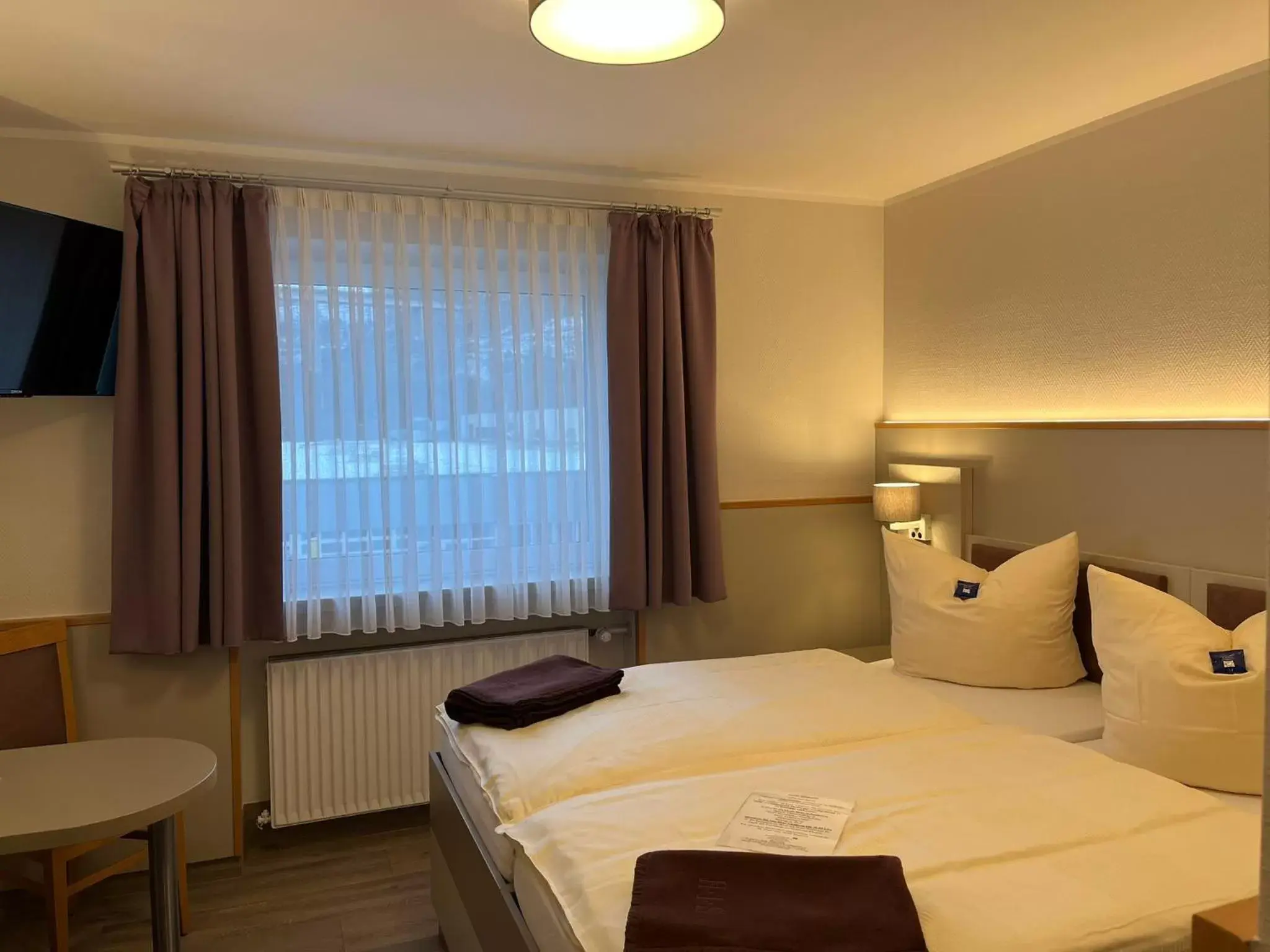Bedroom, Bed in Stadt-gut-Hotel Siegboot