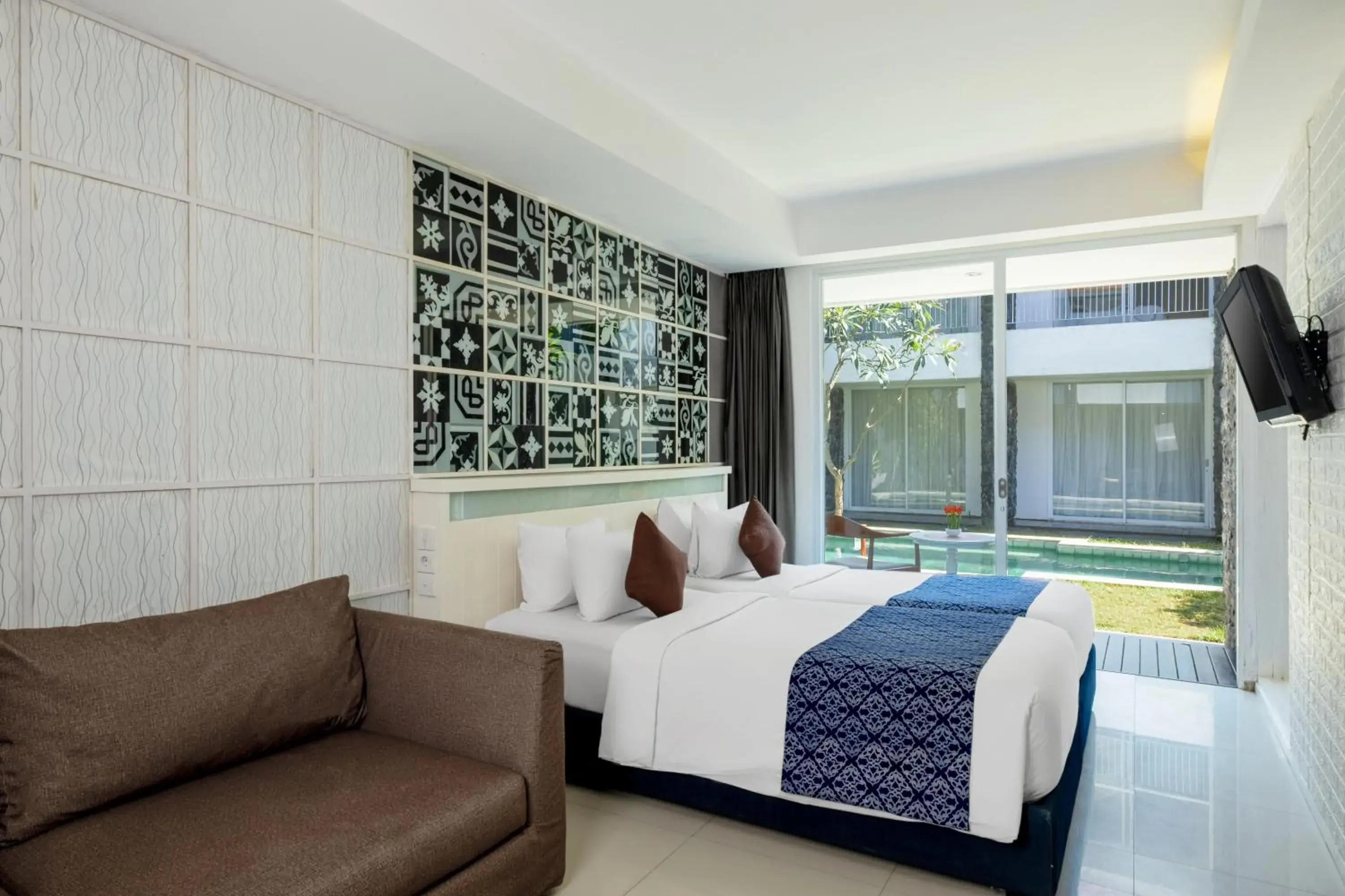 Bed in The Kanjeng Suites & Villas Sanur