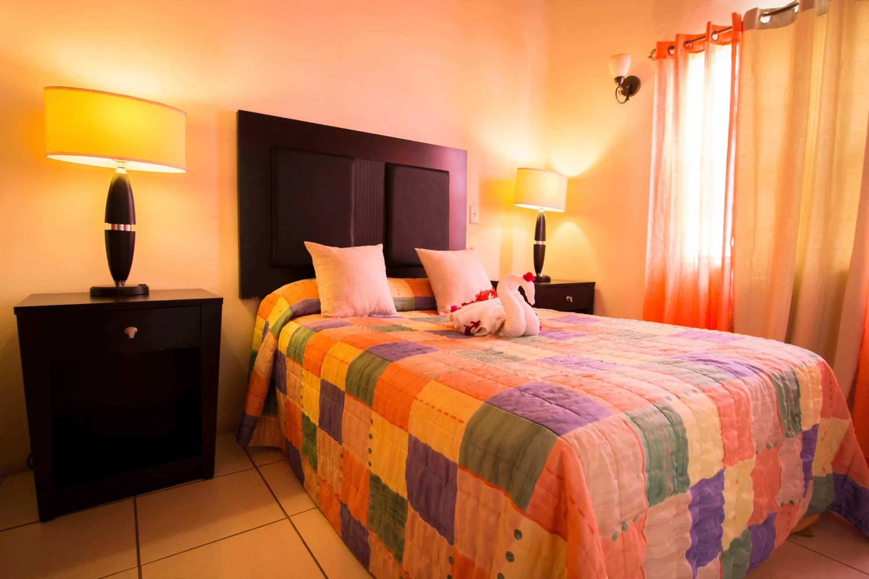 Bed in Connie's Comfort Suites