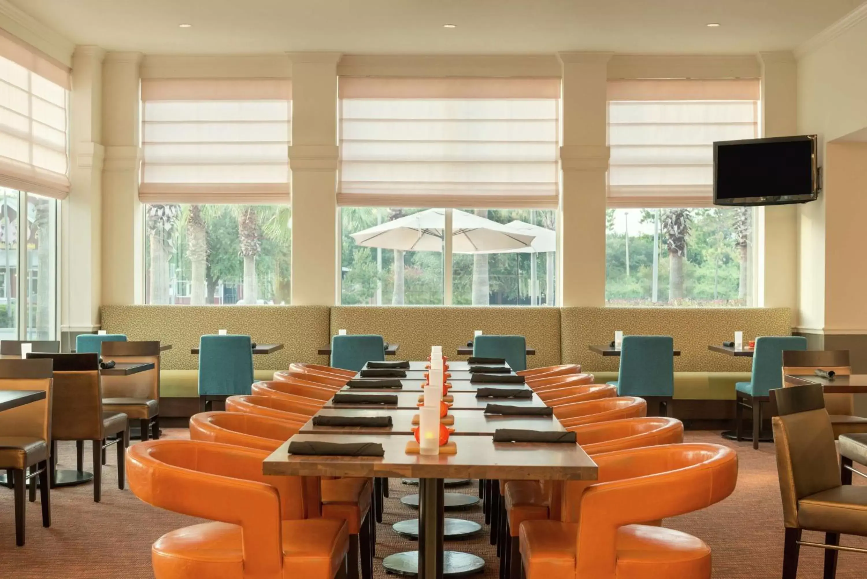 Dining area in Hilton Garden Inn Orlando East - UCF Area