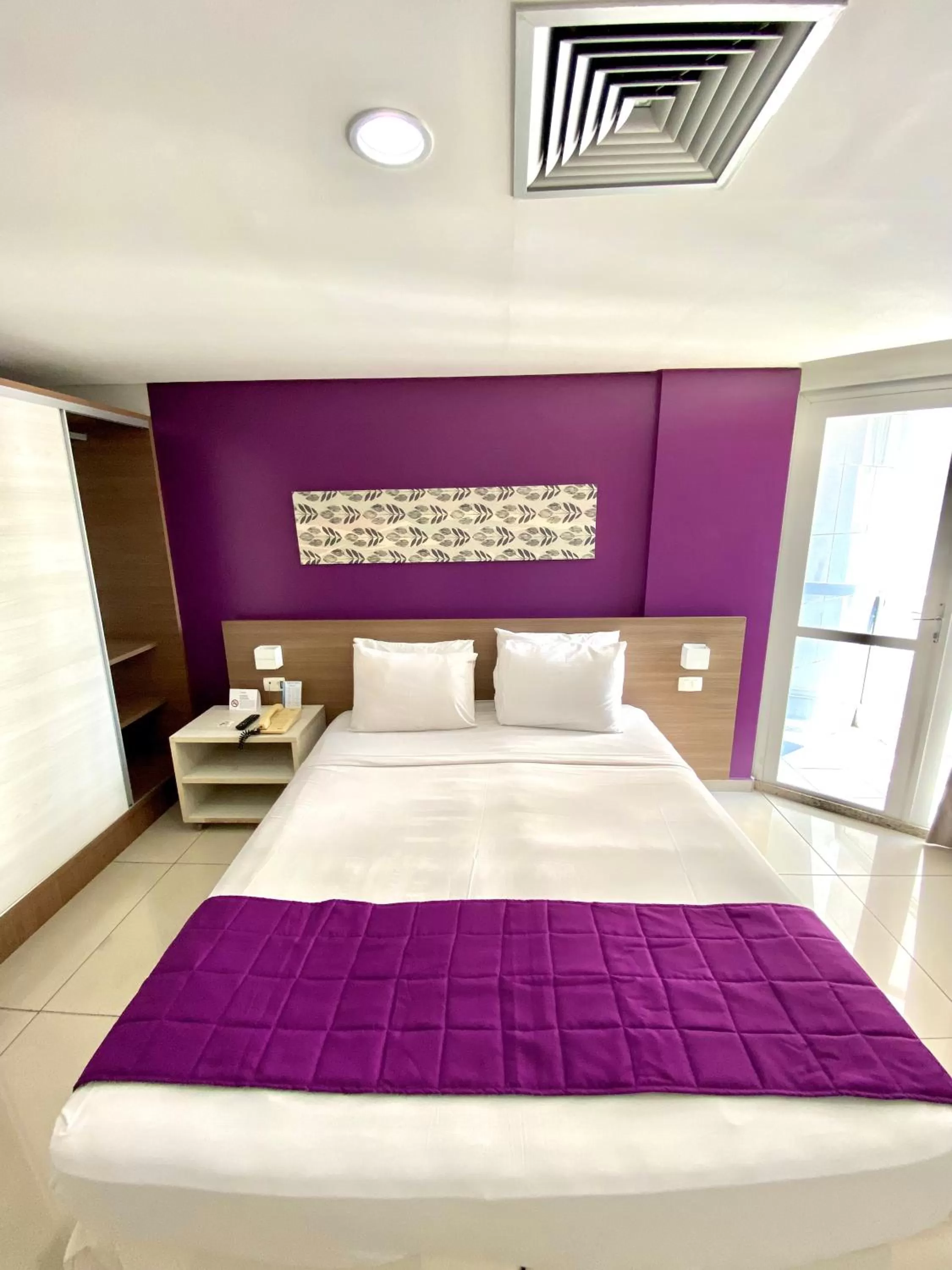 Bed in Nobile Suítes Tambaú