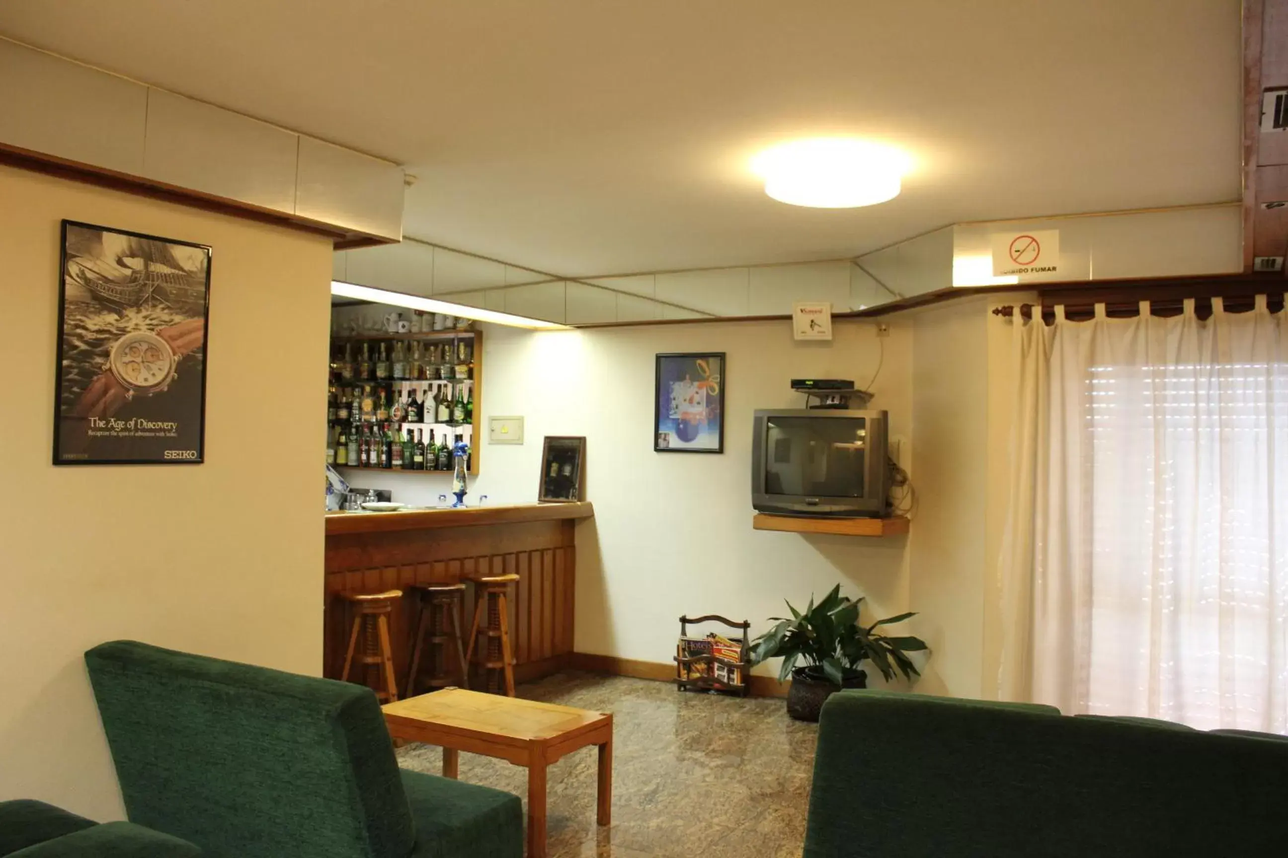 Communal lounge/ TV room, Lobby/Reception in Hotel Bom Sucesso