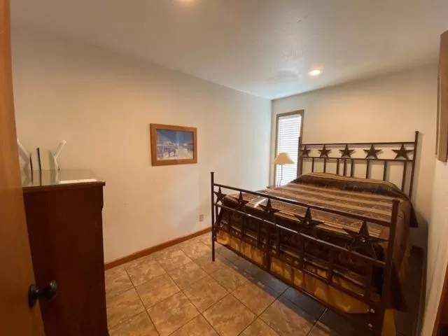 Bed in Flying L Ranch Resort & Golf Course