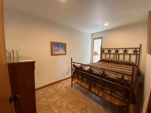 Bed in Flying L Ranch Resort & Golf Course Bed in Flying L Ranch Resort & Golf Course