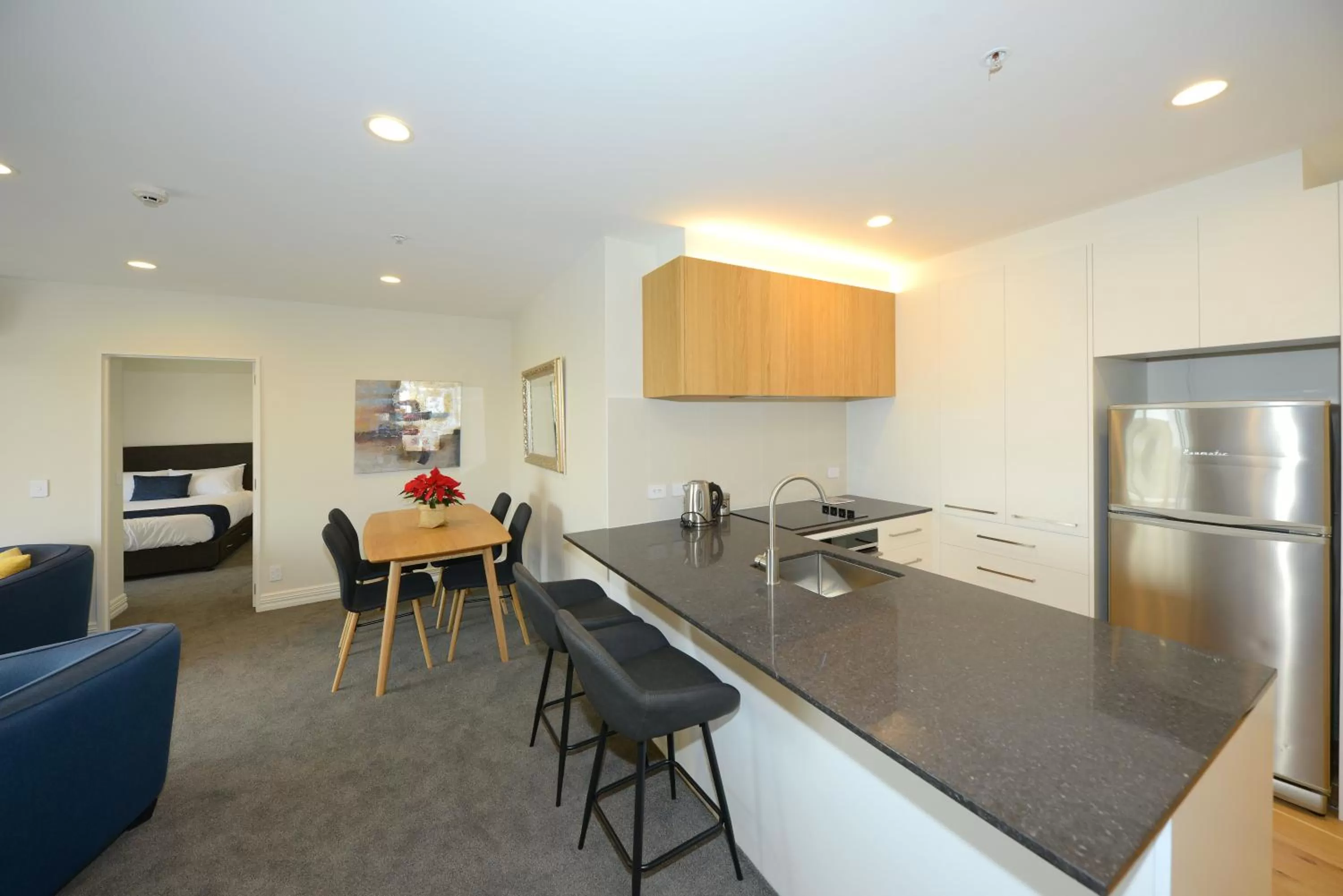 Kitchen or kitchenette in West Fitzroy Apartments