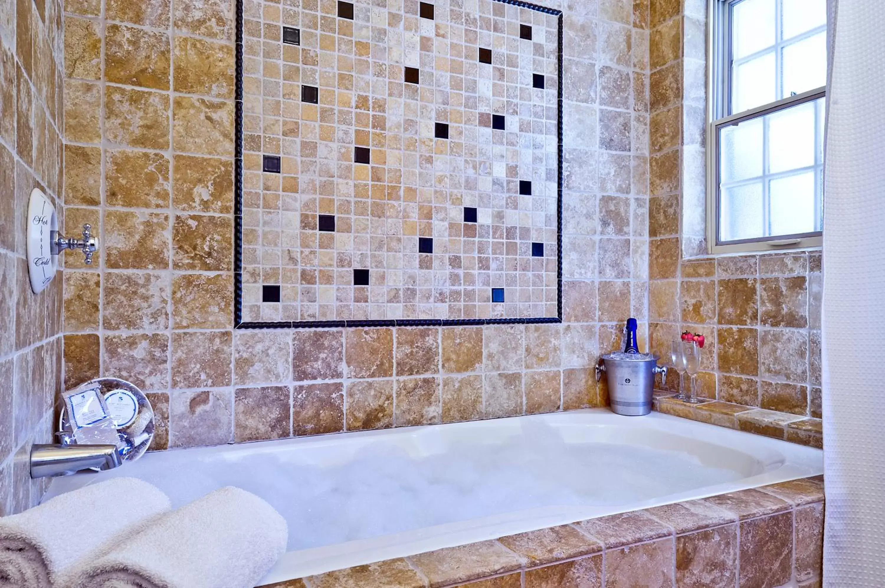 Bathroom in Maison Fleurie, A Four Sisters Inn