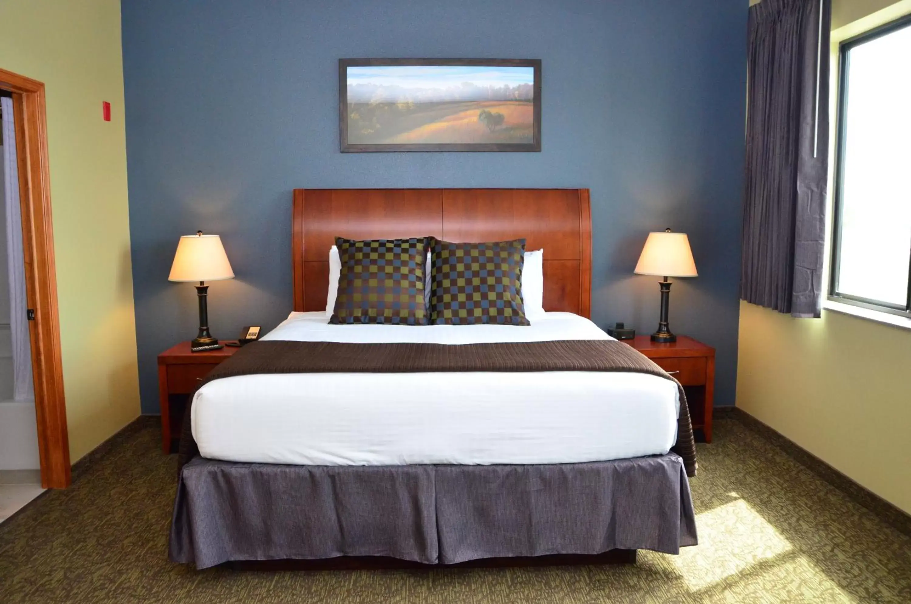 Bed in Cobblestone Inn & Suites - Newton