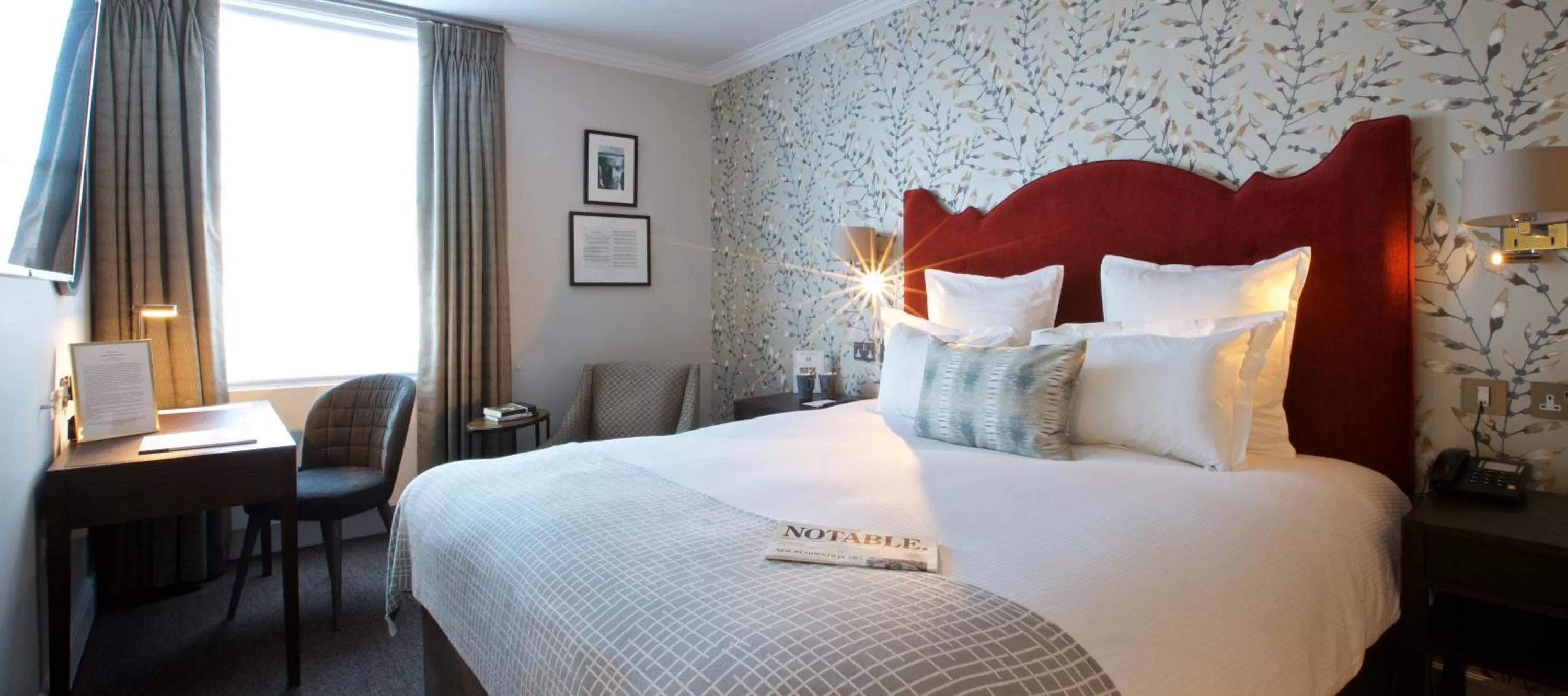 Bed in 54 Queen's Gate Hotel