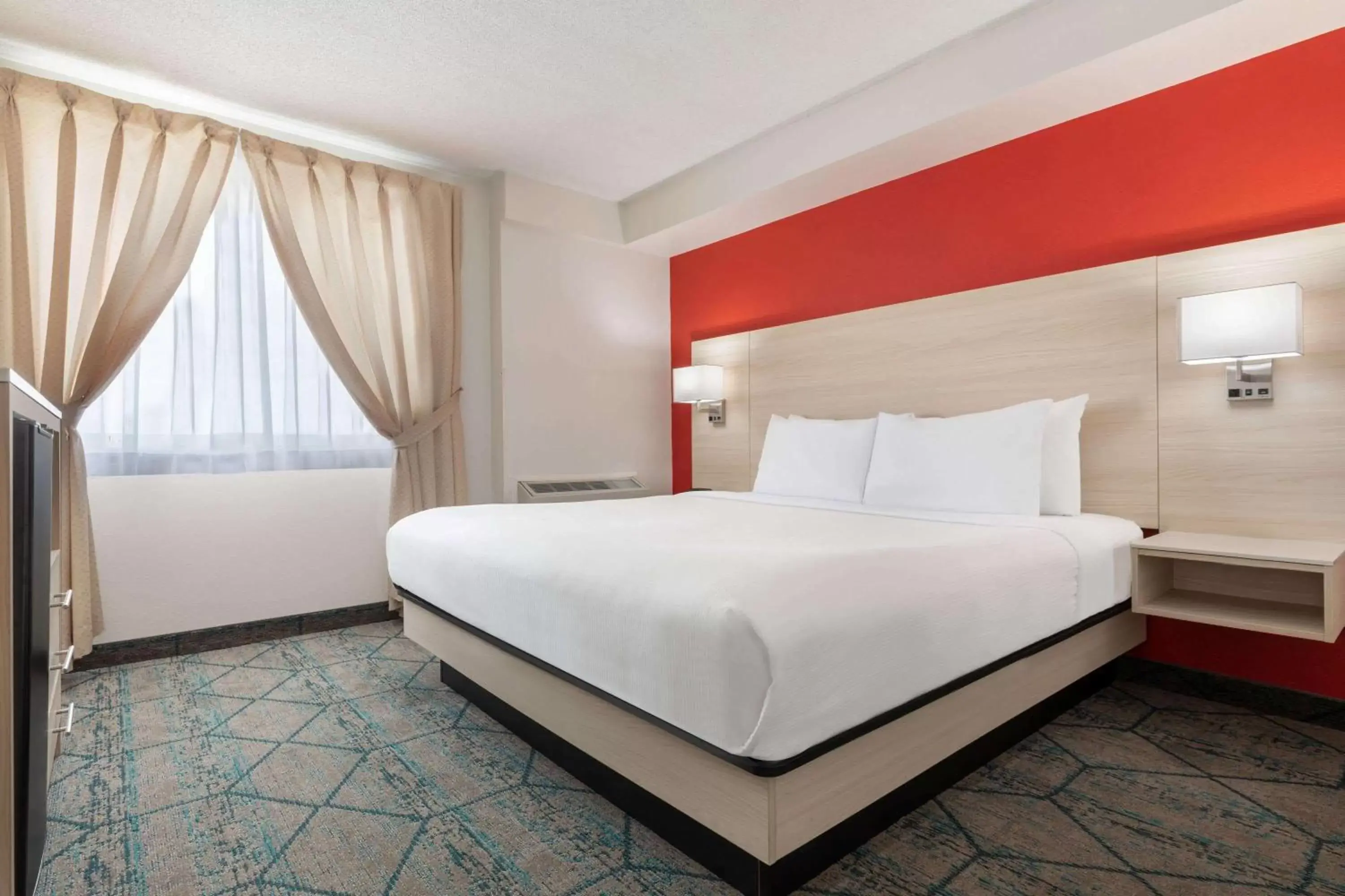 Bed in Ramada by Wyndham Miramichi New Brunswick