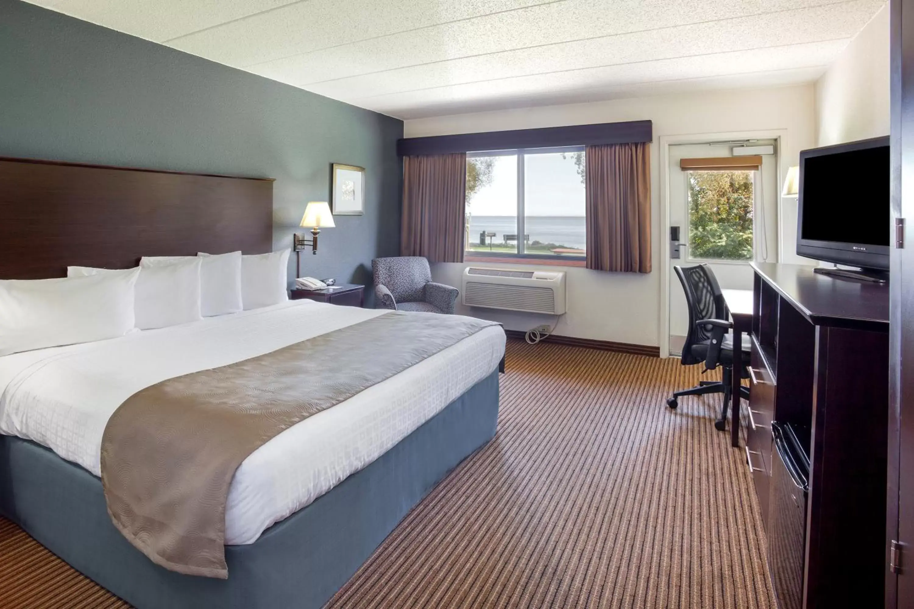 Photo of the whole room, Bed in AmericInn by Wyndham Menominee