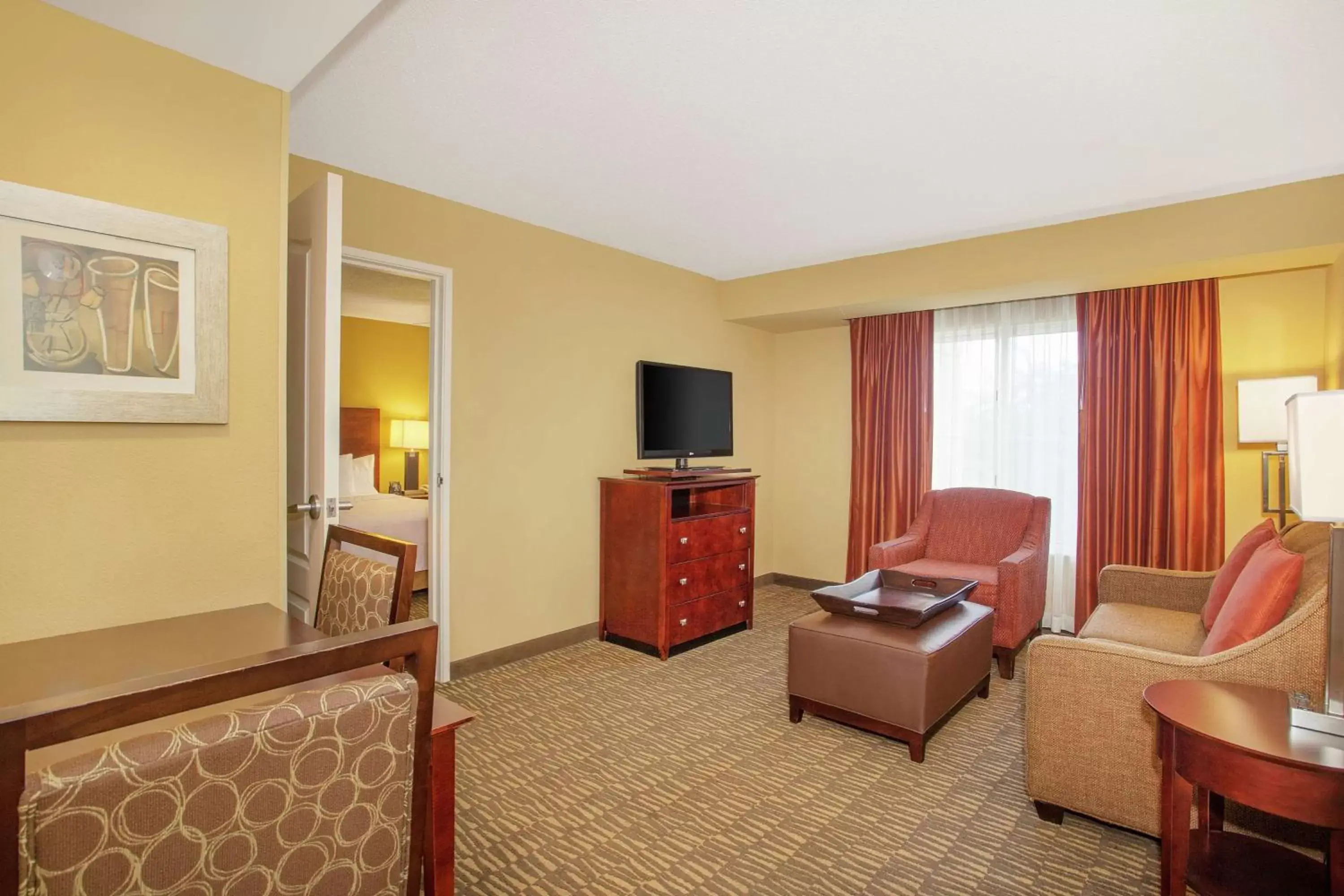 Bedroom, TV/Entertainment Center in Homewood Suites by Hilton Tampa-Brandon