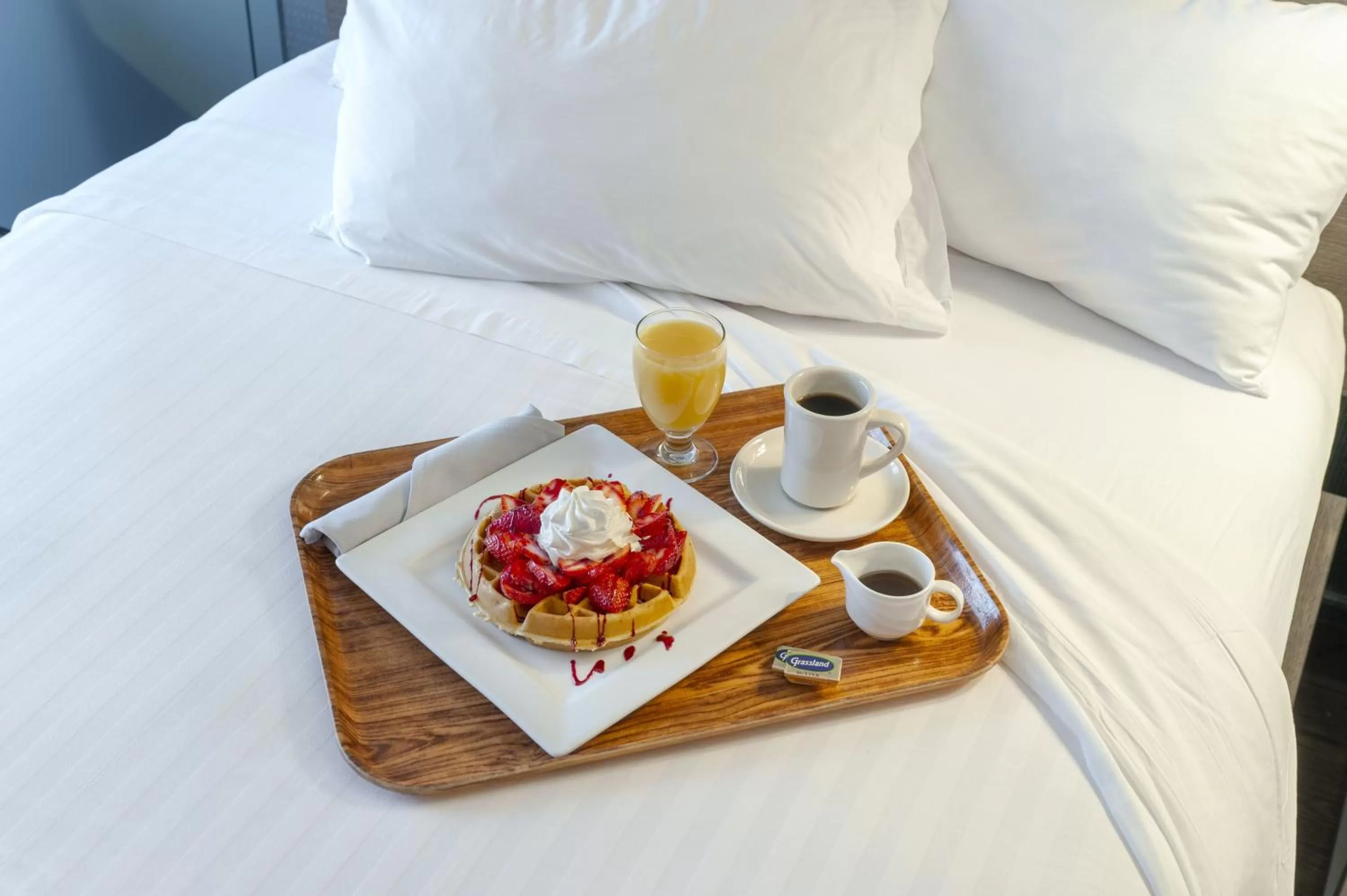 Bed in RIT Inn & Conference Center