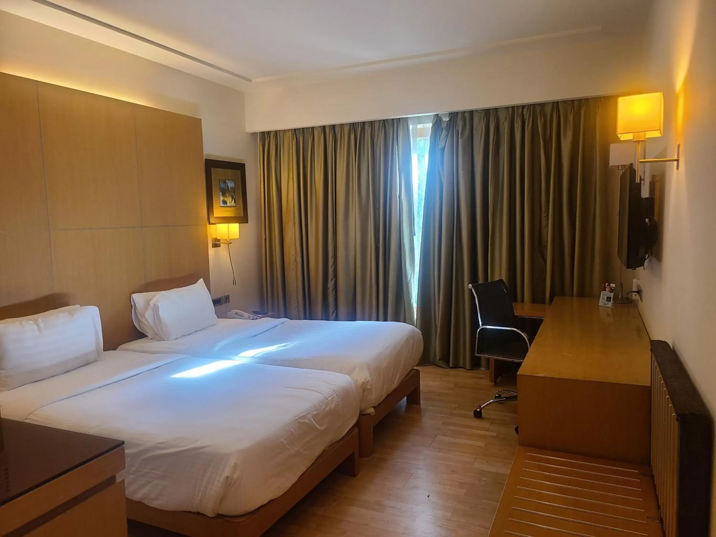 Photo of the whole room, Bed in Novotel Hyderabad Airport