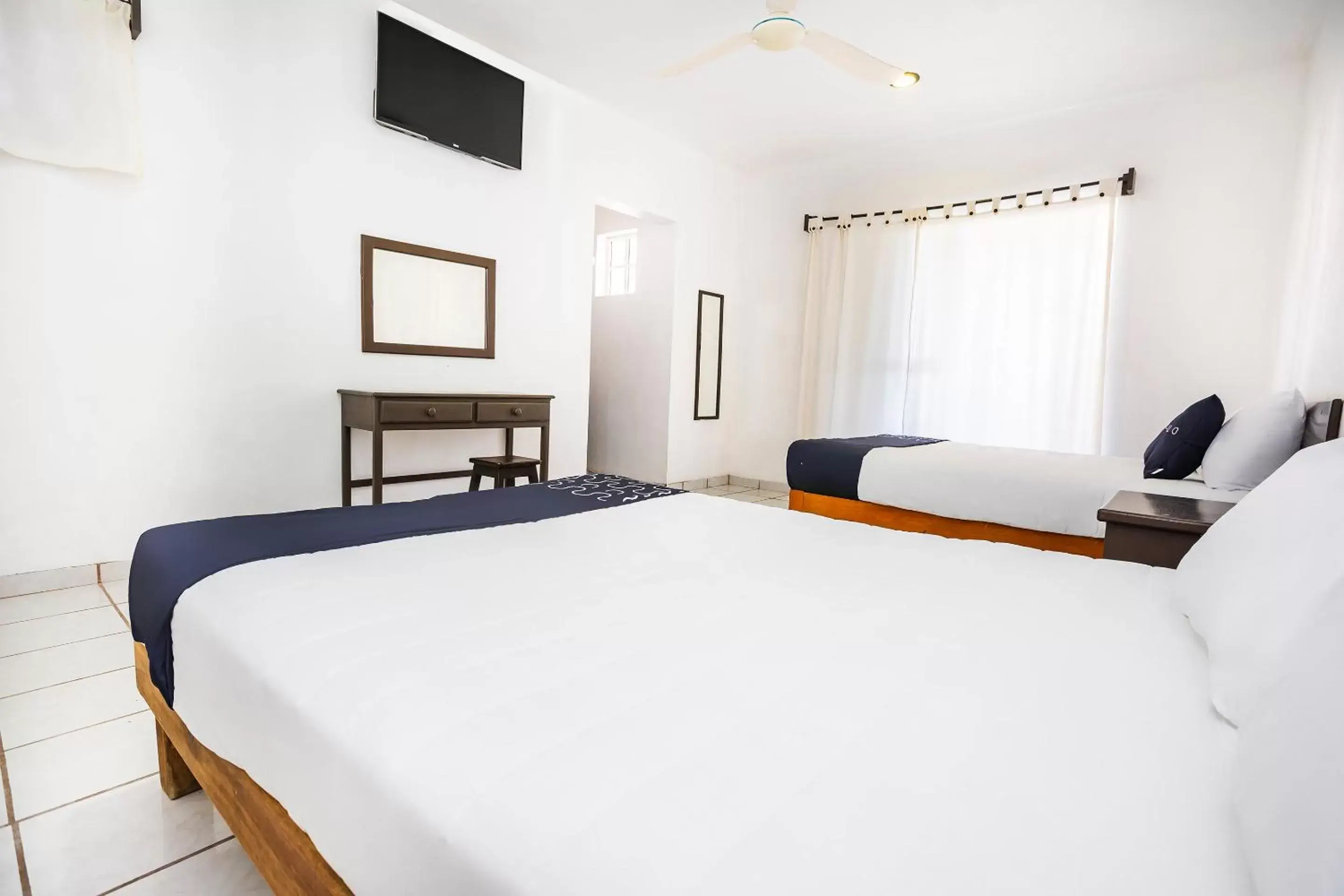 Bedroom, Bed in Capital O Oxtankah,chetumal bay