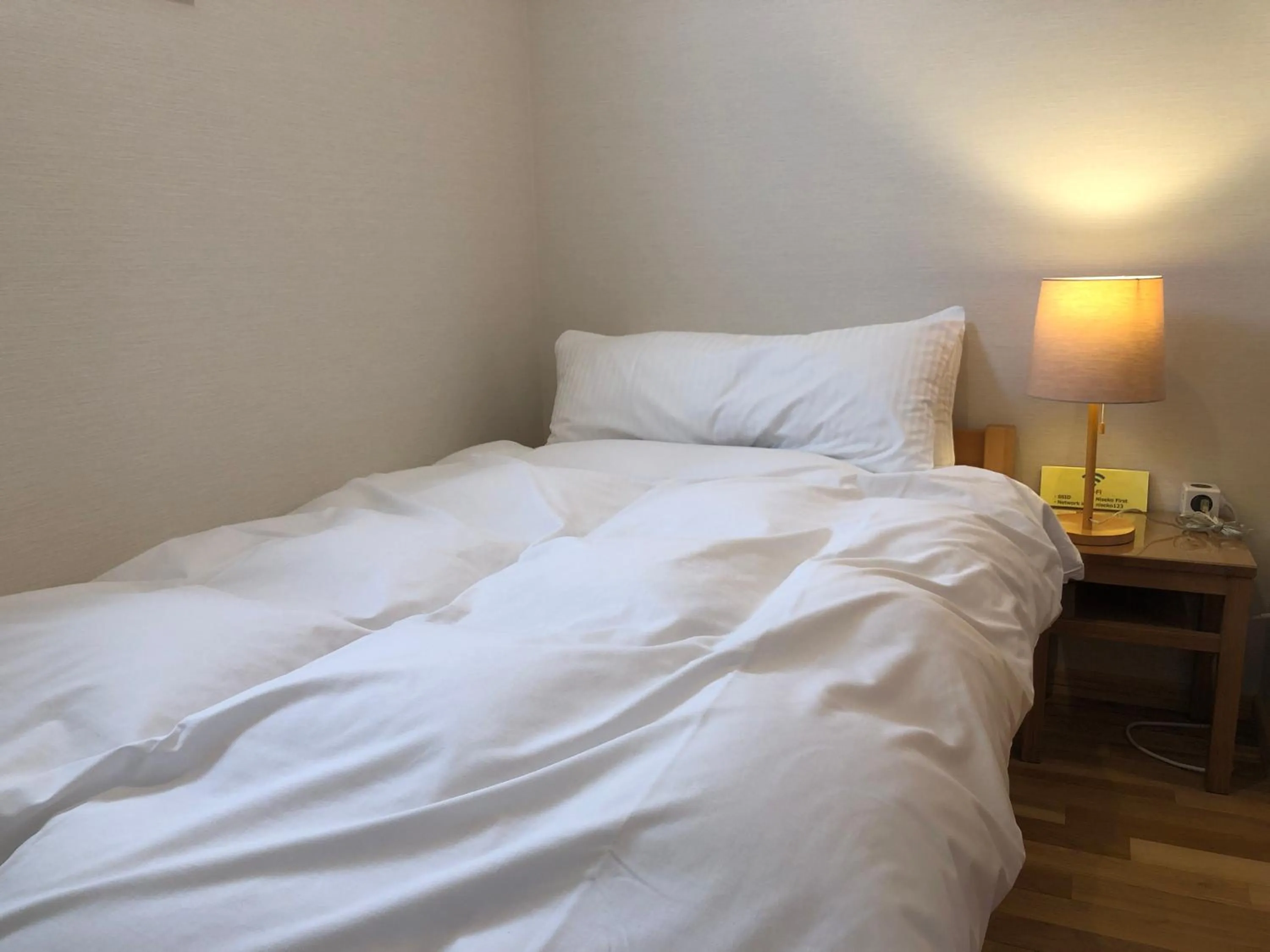 Bed in Hotel Resort Inn Niseko