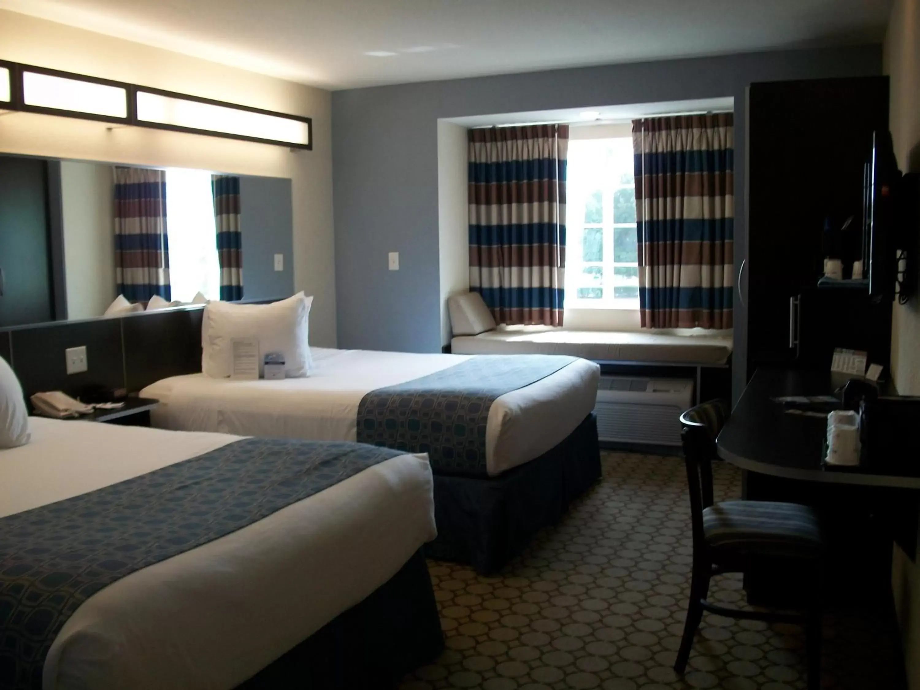 Deluxe Queen Room with Two Queen Beds - Disability Access - Non-Smoking in Microtel Inn & Suites by Wyndham Spring Hill/Weeki Wachee