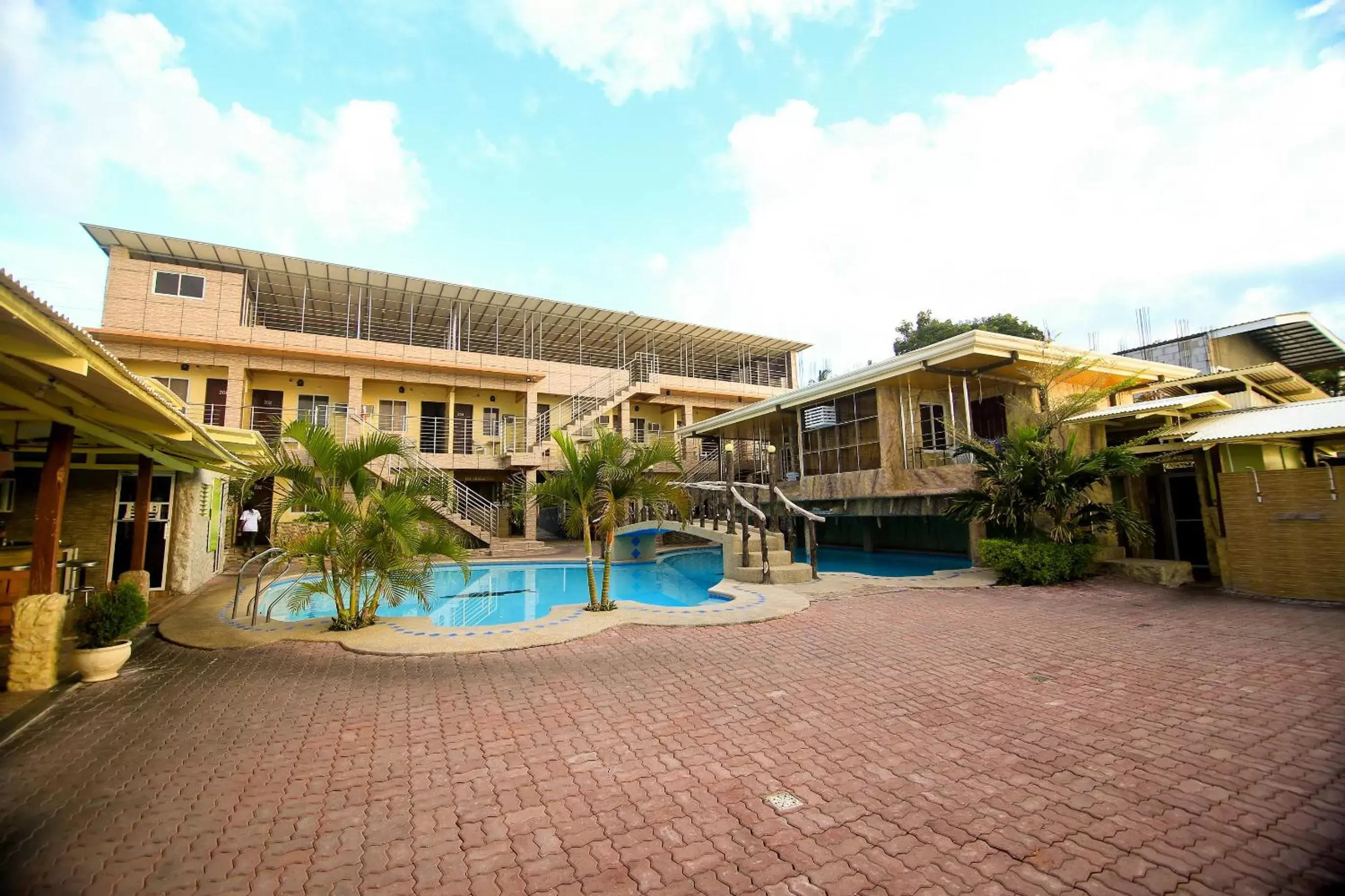 Property building, Swimming Pool in GingGing Hotel And Resort