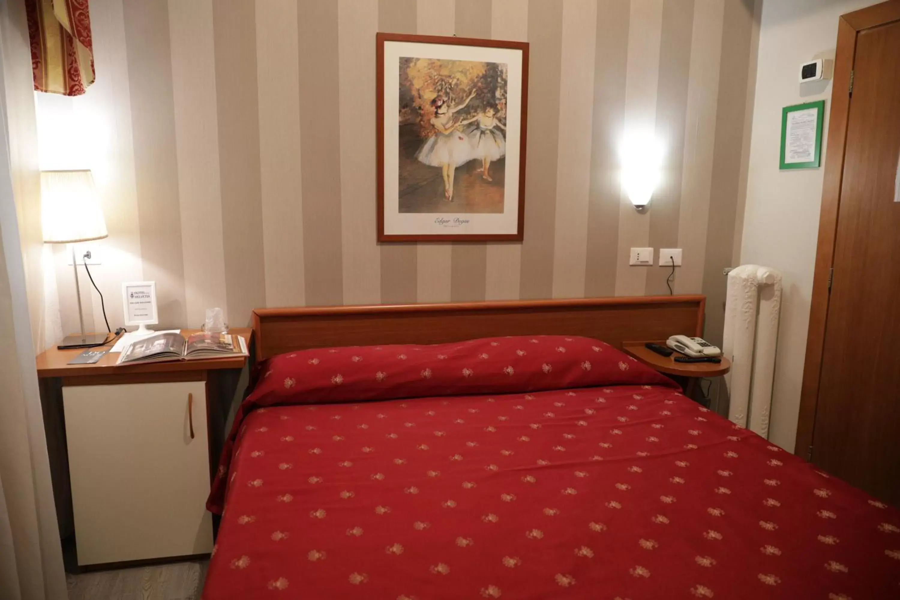 Bed in Hotel Helvetia
