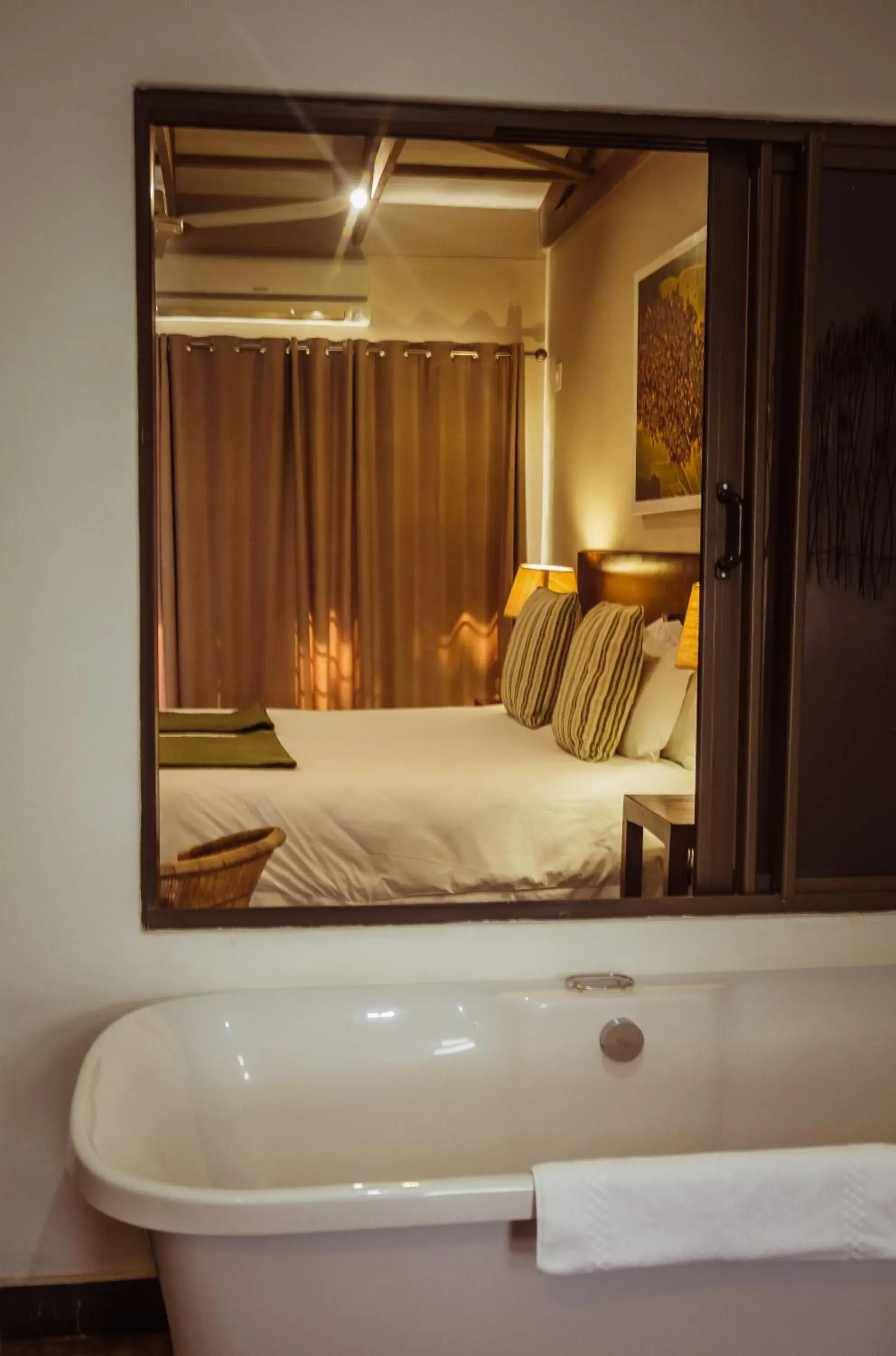 Bathroom, Bed in Bushveld Terrace - Hotel on Kruger
