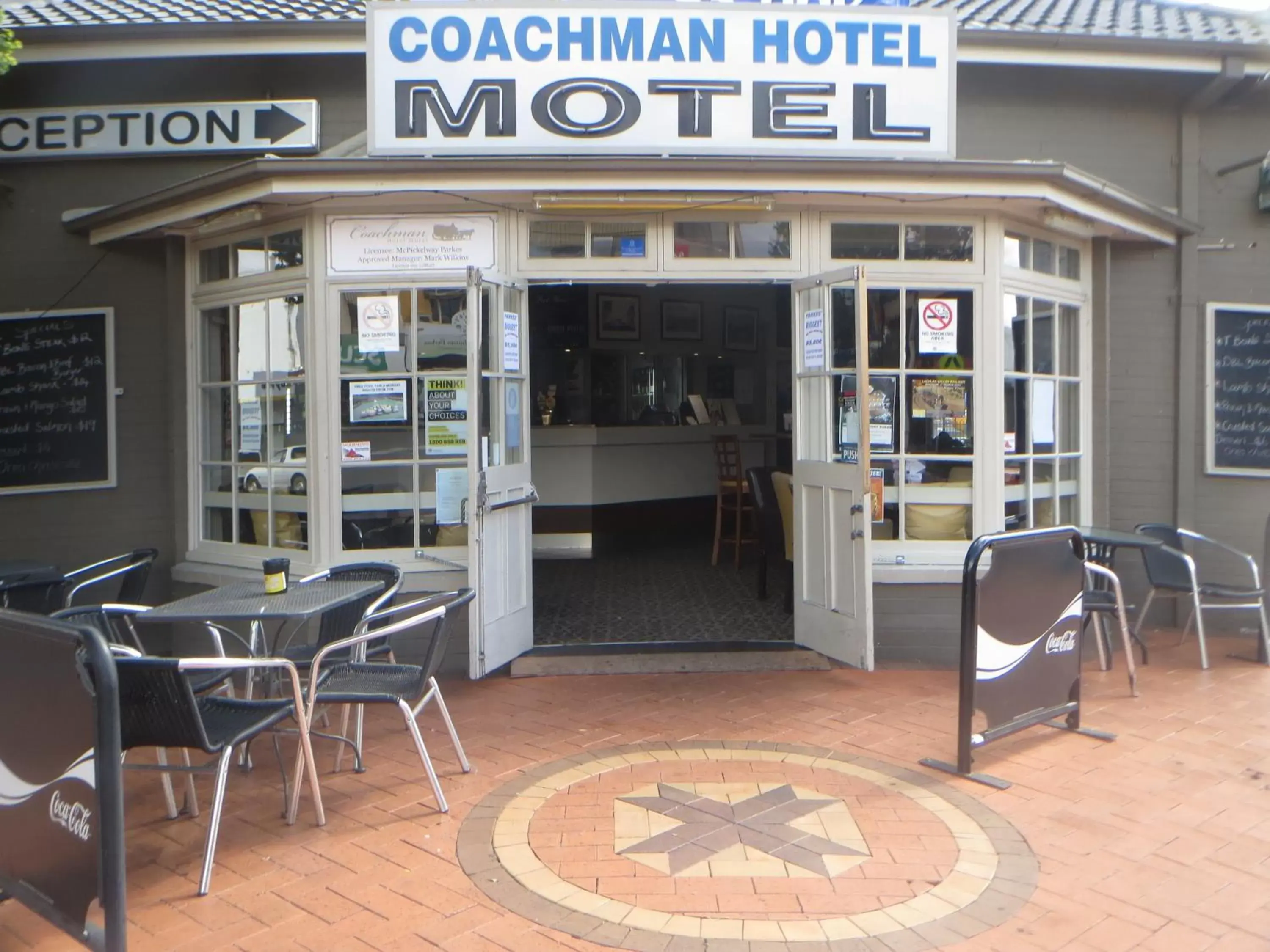 Facade/entrance in Coachman Hotel Motel