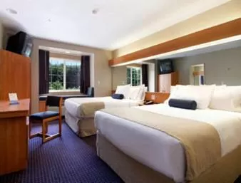 Queen Room with Two Queen Beds and Bathtub - Mobility/Hearing Accessible - Non-Smoking in Microtel Inn & Suites by Wyndham Hazelton/Bruceton Mills