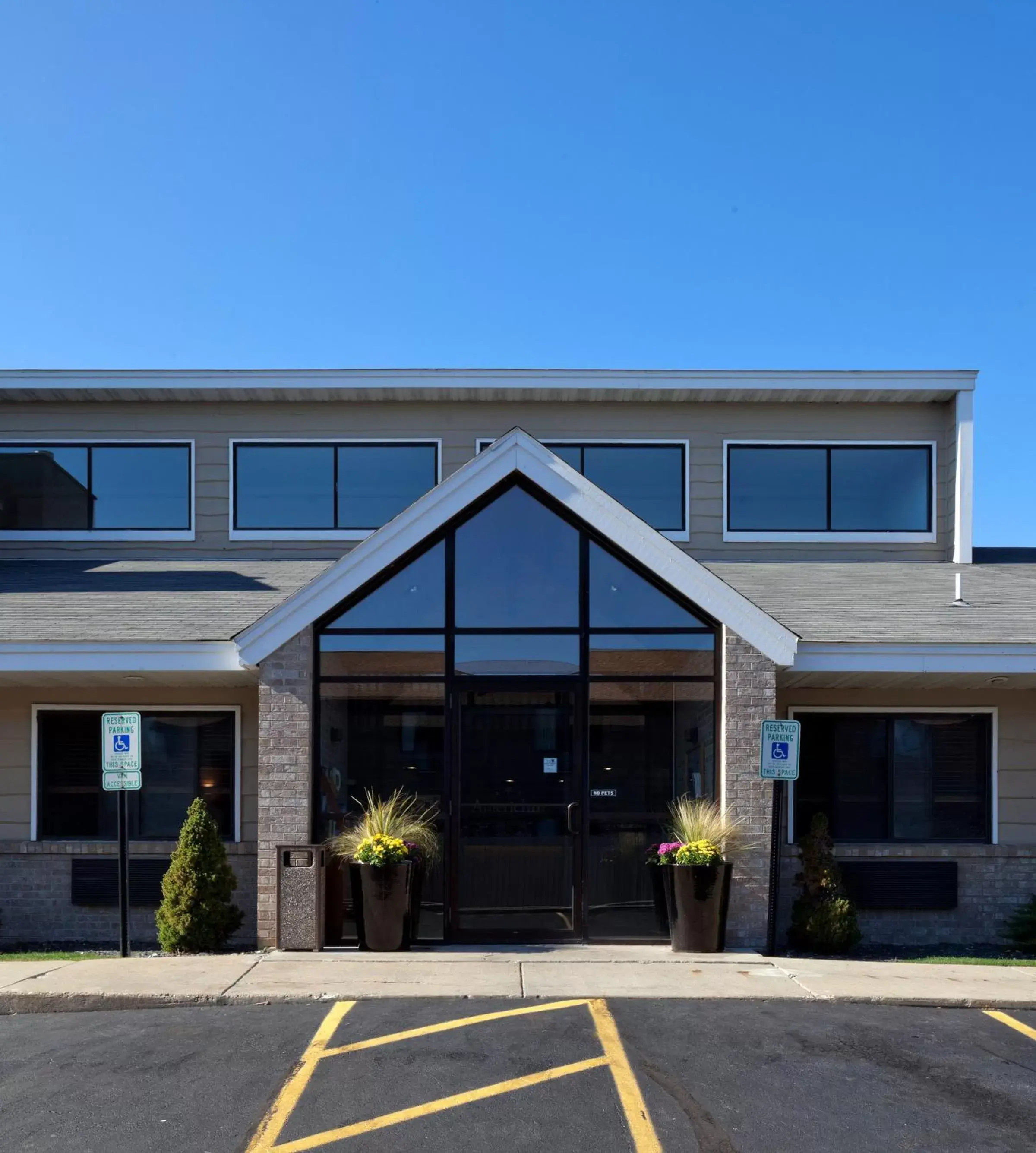 Property building in AmericInn by Wyndham Hartford WI