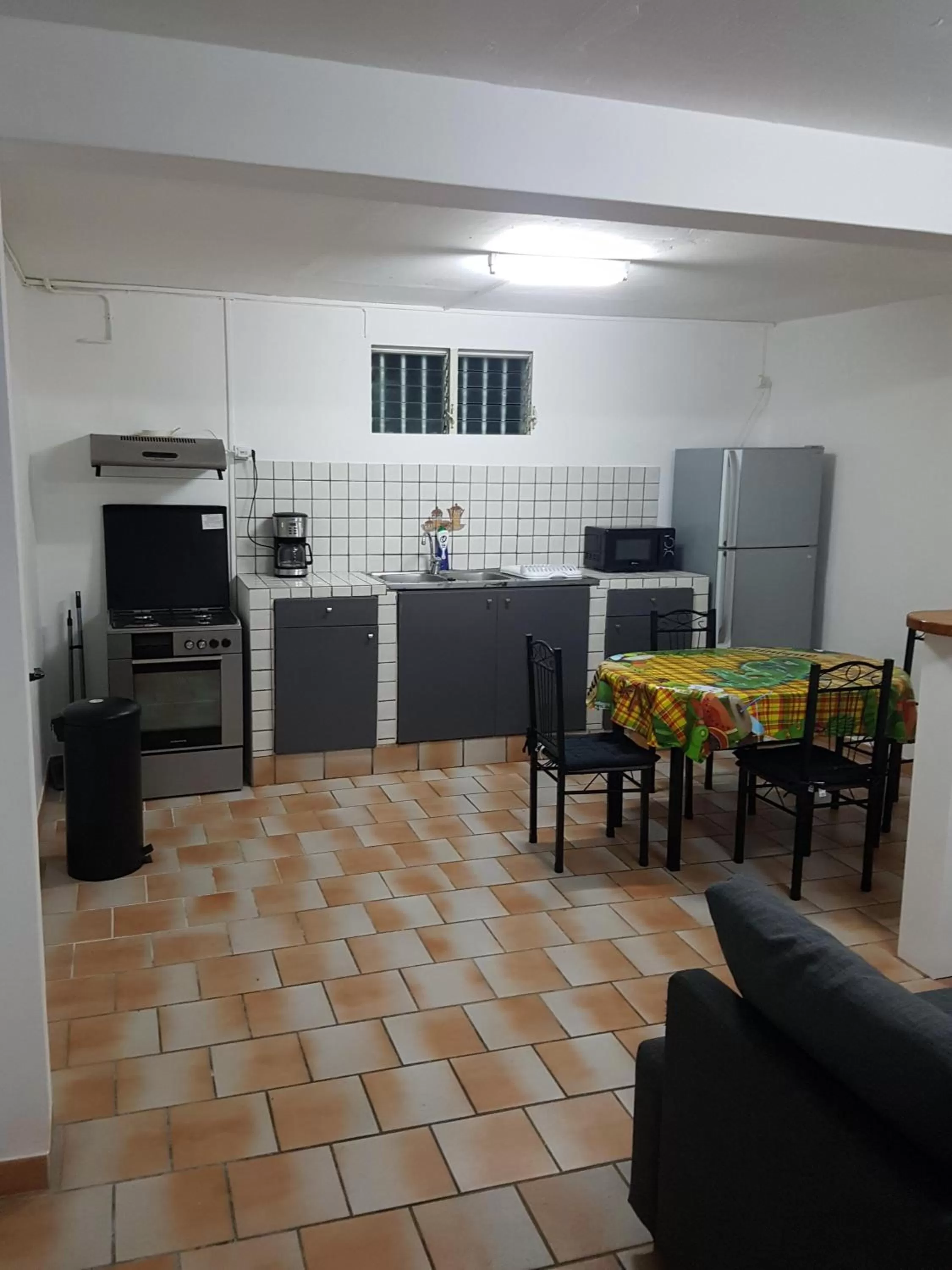 Kitchen or kitchenette in Appartement de la Baie