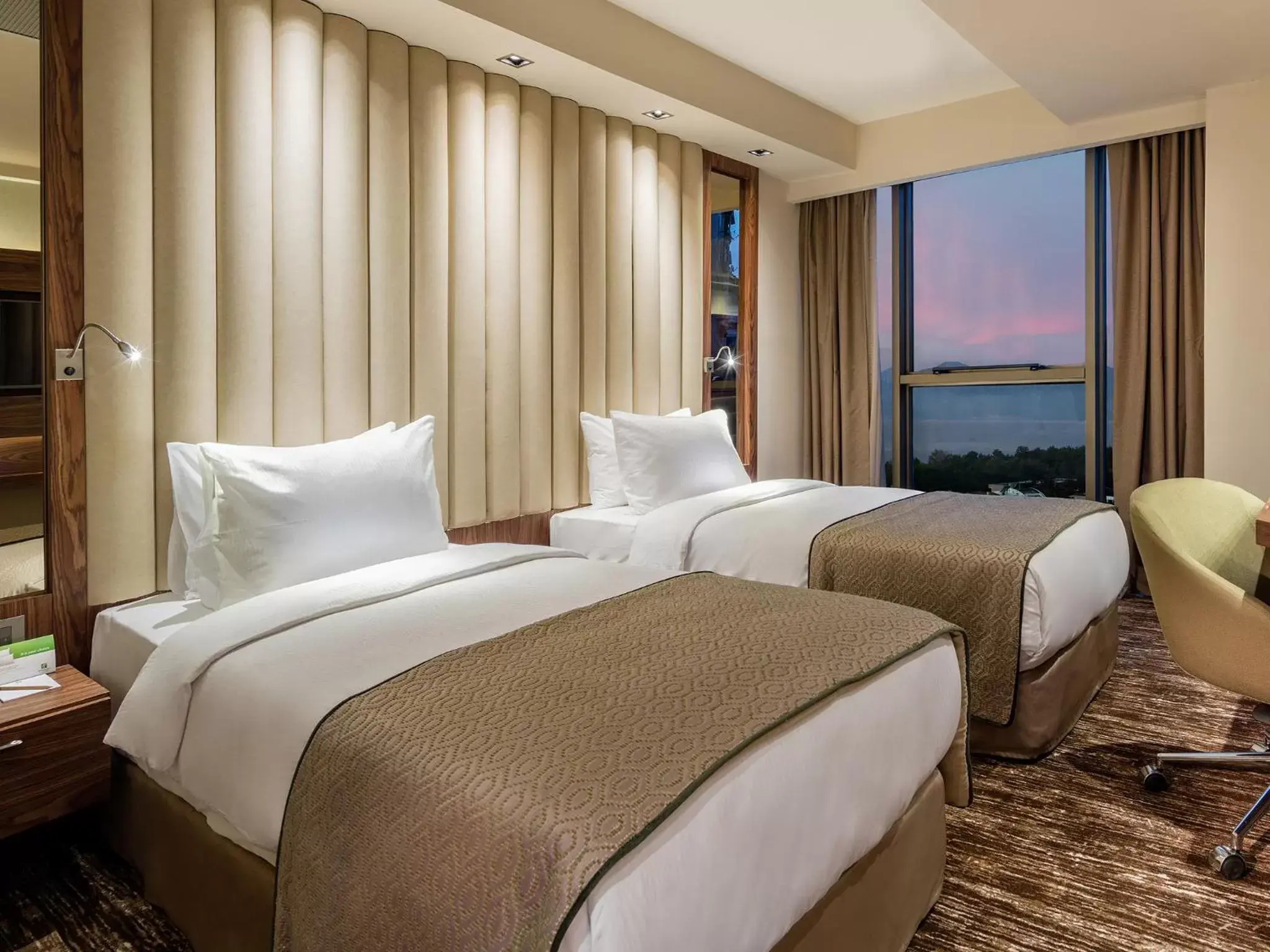 Bed in Holiday Inn Antalya - Lara, an IHG Hotel