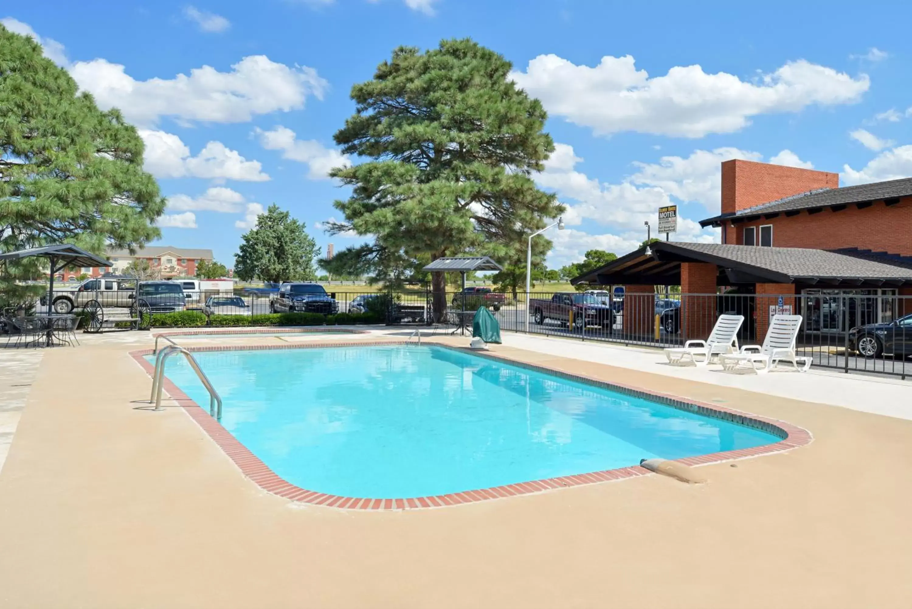 Swimming pool, Property Building in Ranch House Motel