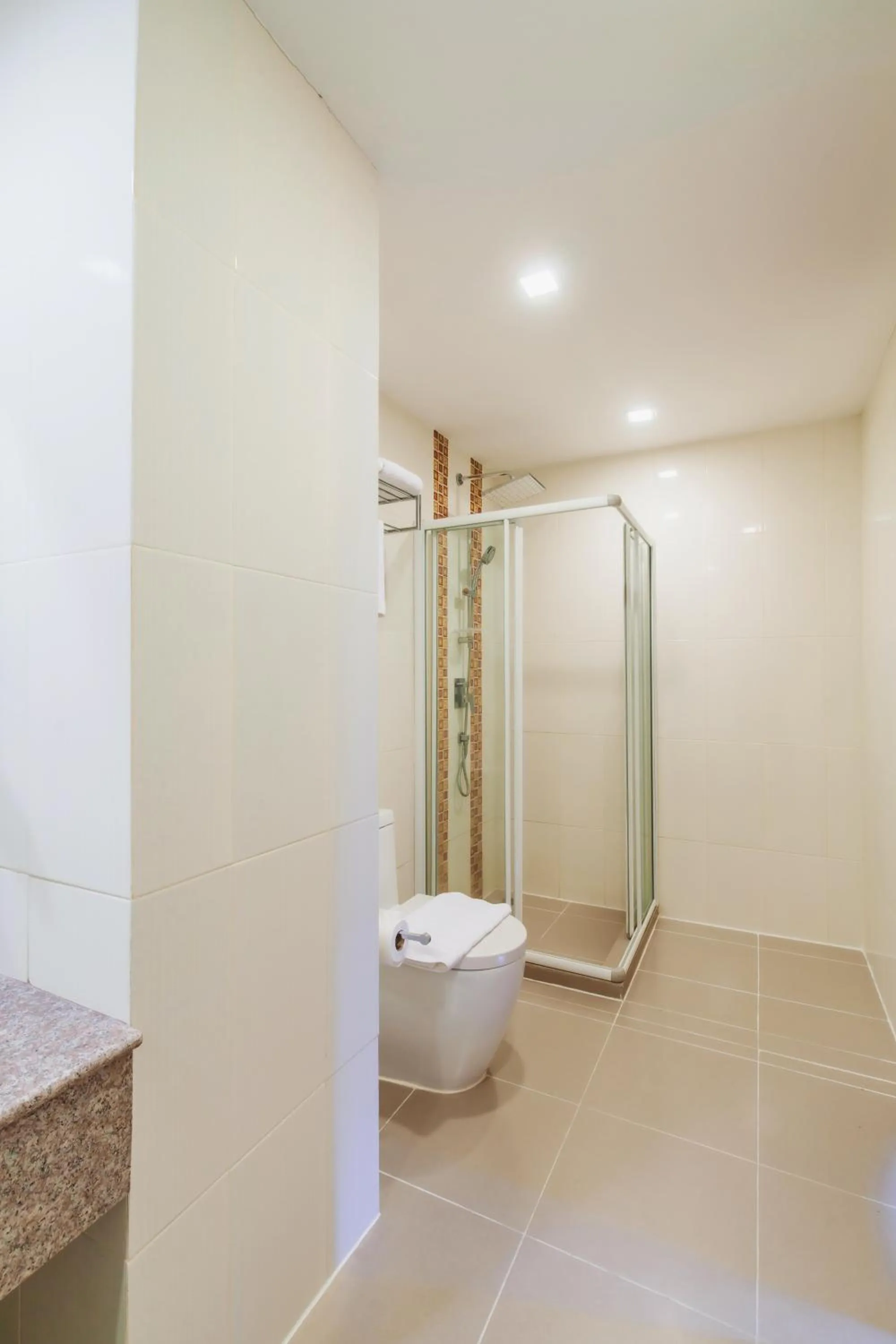 Shower in Elite Suites Patong