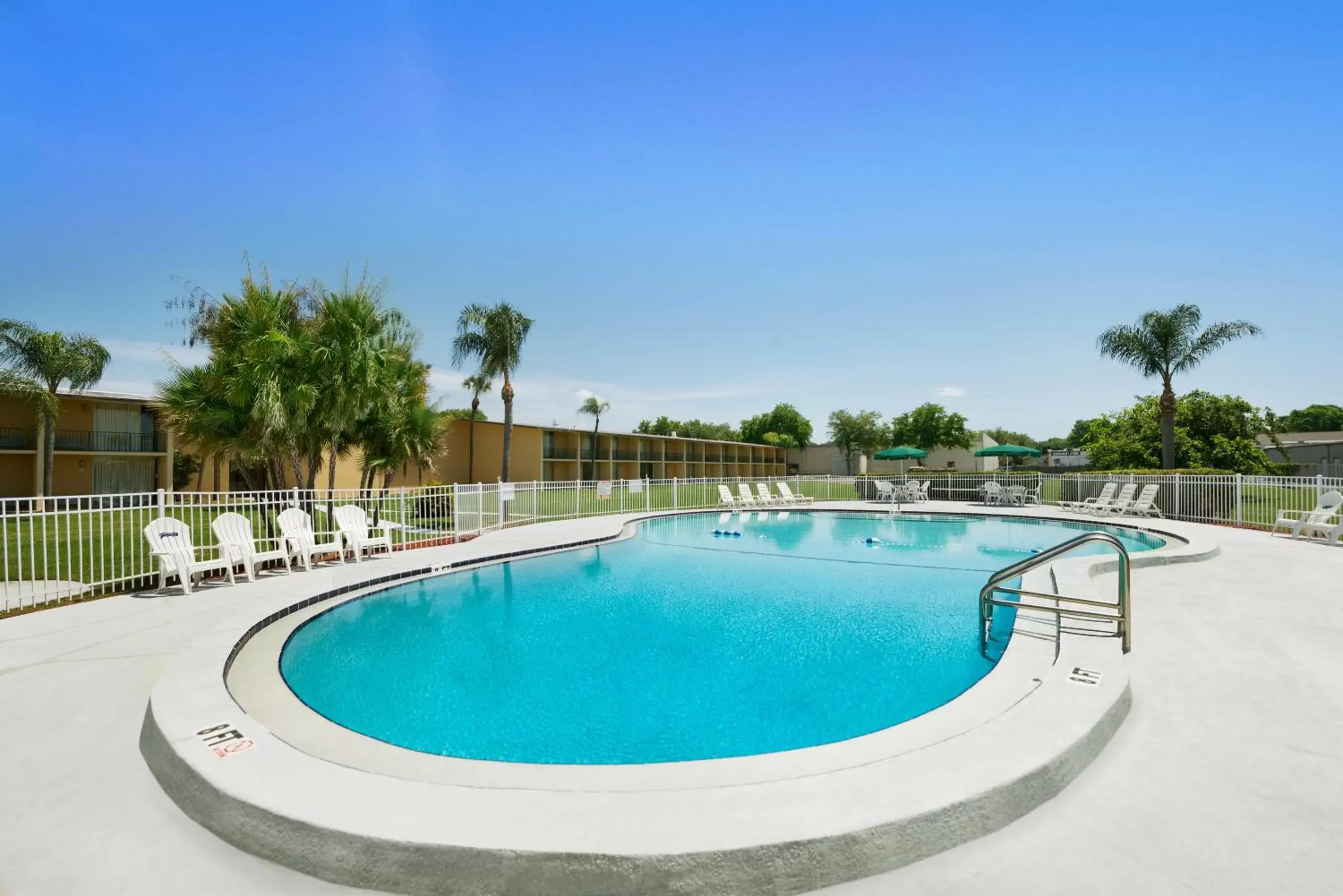 Day, Swimming Pool in Howard Johnson by Wyndham Winter Haven FL