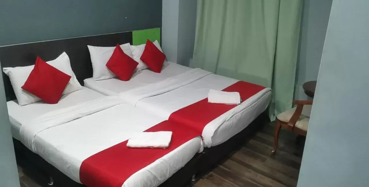 Bed in Lucky Hotel