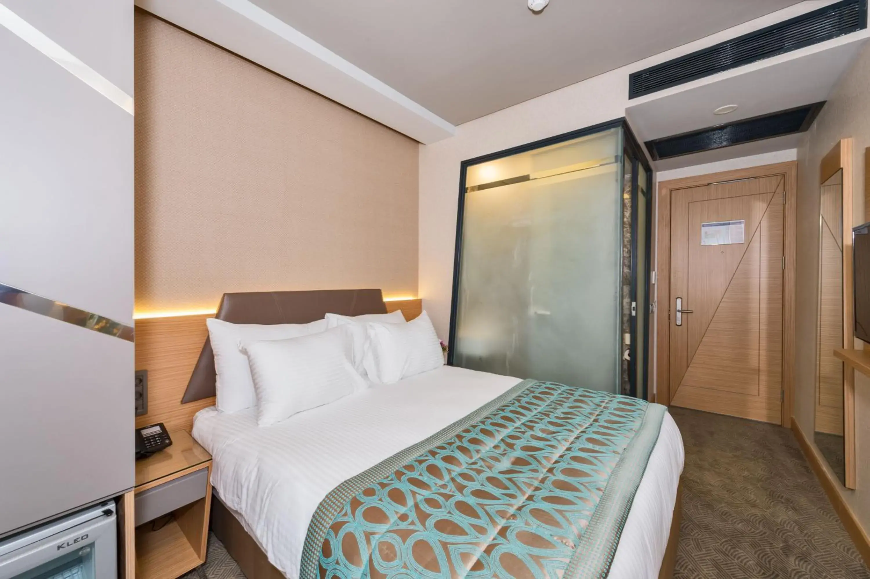 Bed in Hotel Genova