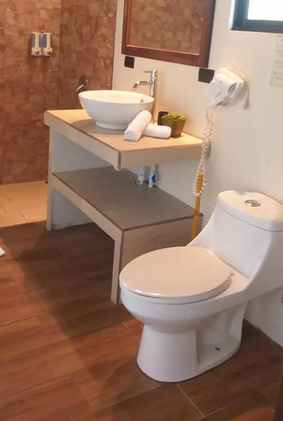 Bathroom in Tropical Suites & Villas