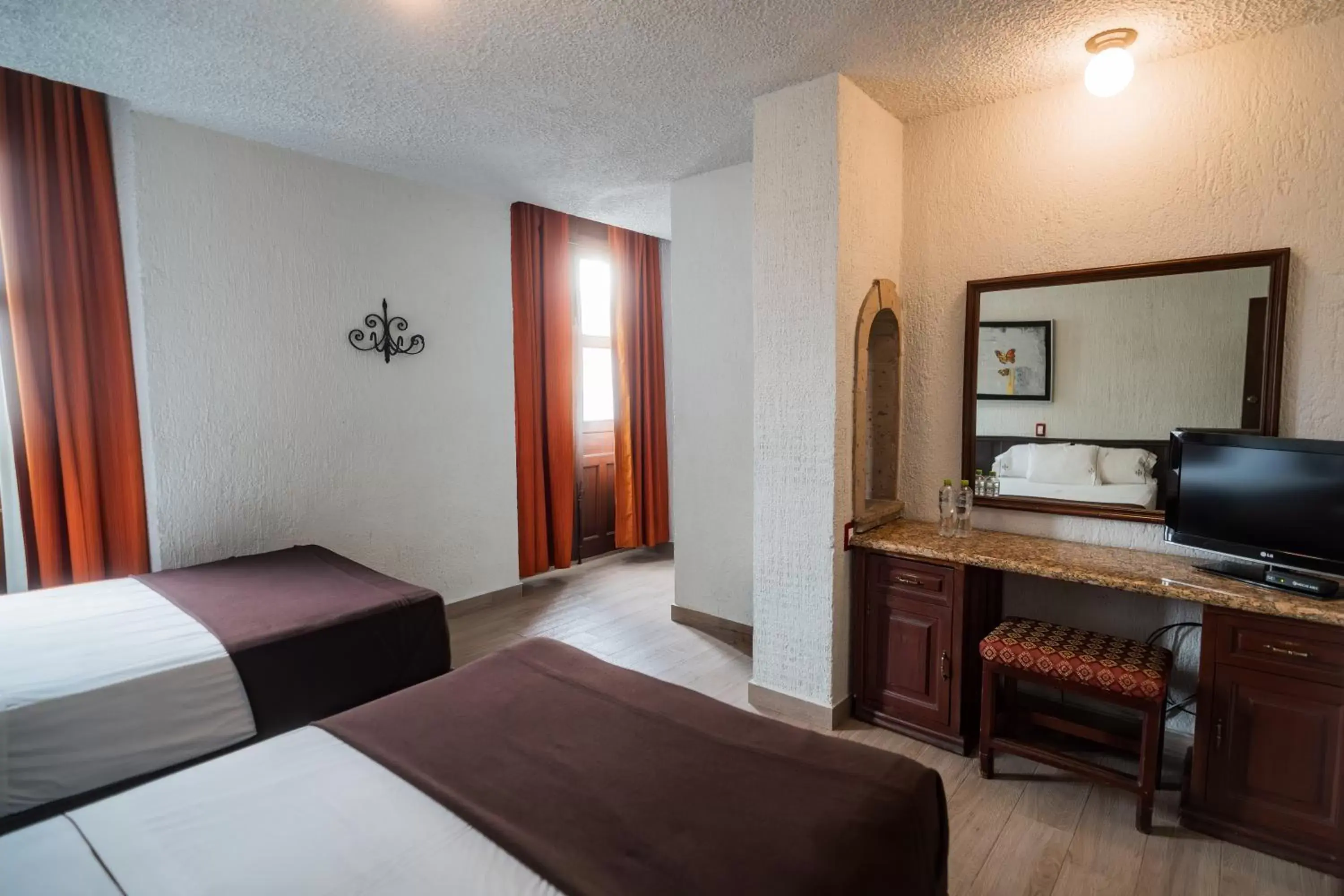 Bed in Hotel Don Quijote Plaza - Guadalajara Centro Historico