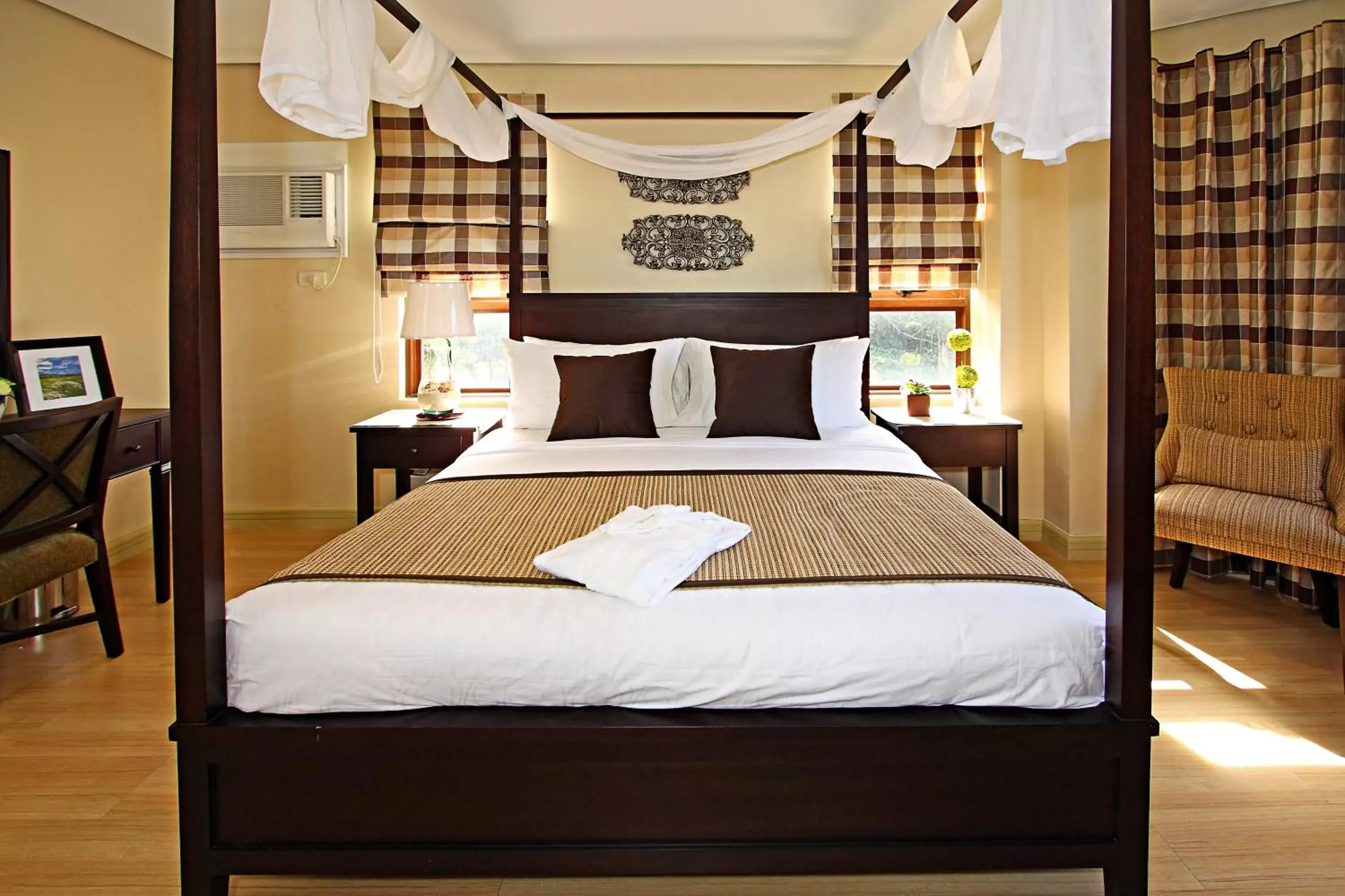 Bed in Crosswinds Resort Suites