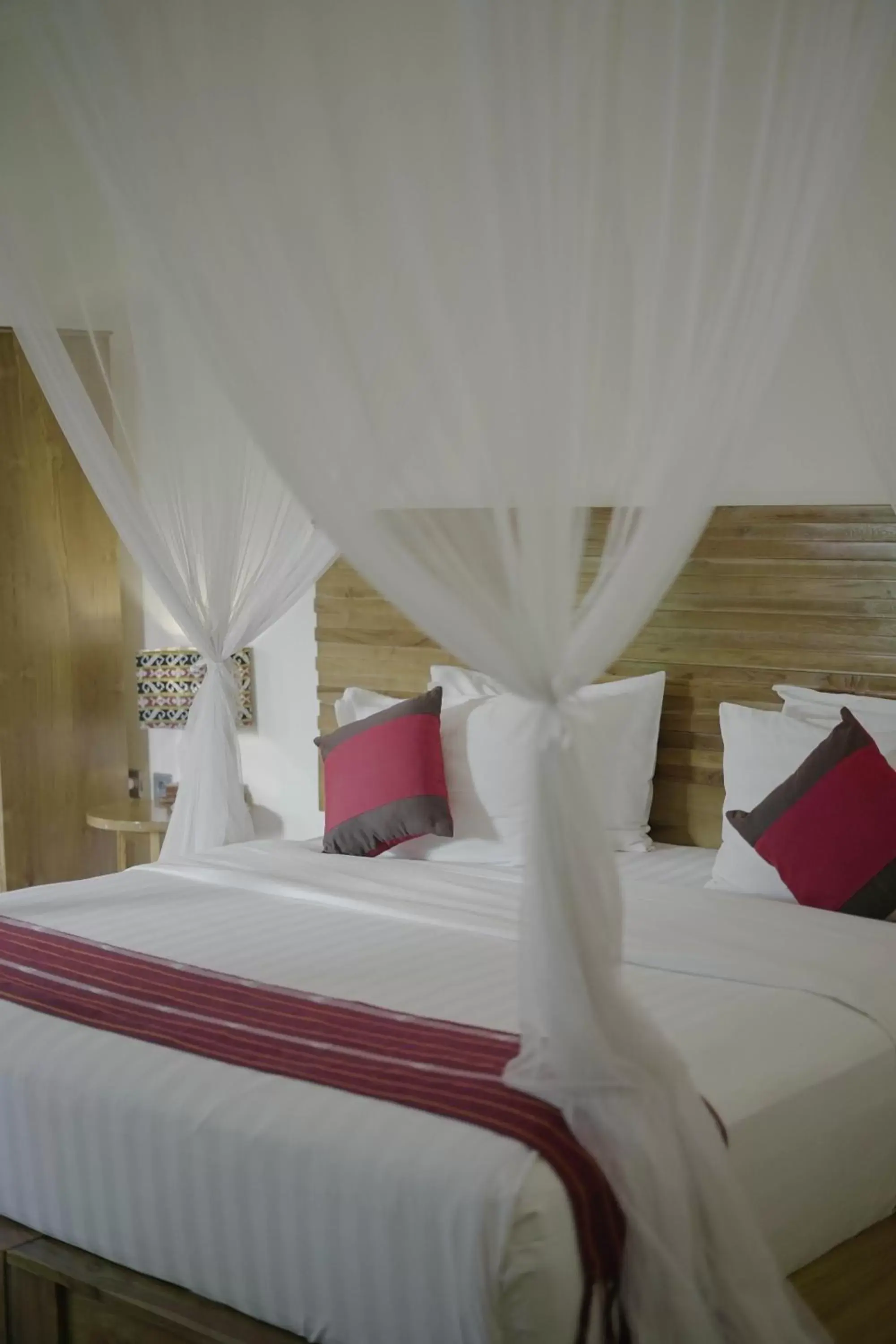 Bed in Puri Sari Beach Hotel