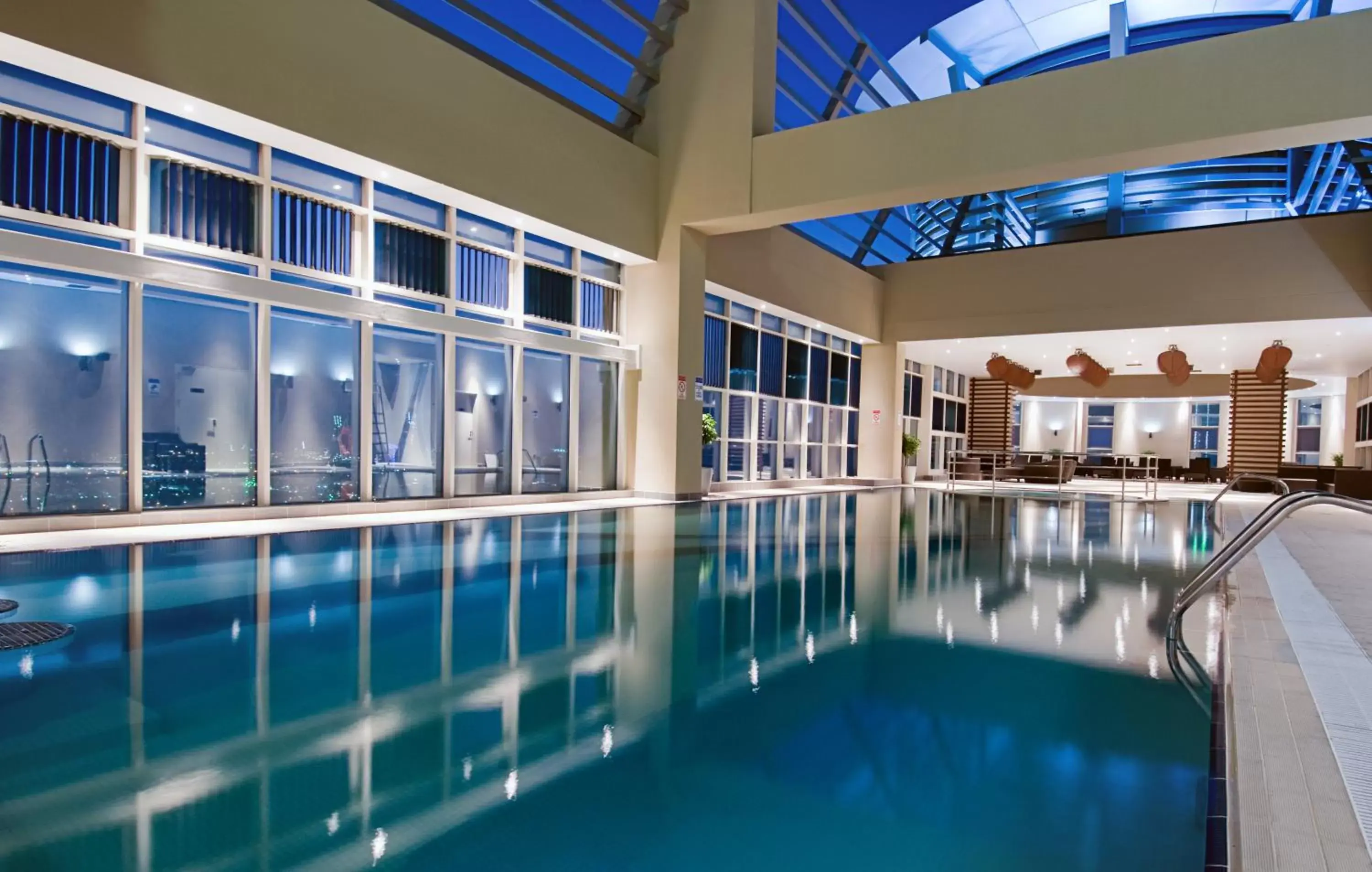 Lounge or bar, Swimming Pool in Grand Millennium Al Wahda Hotel and Executive Apartments Abu Dhabi